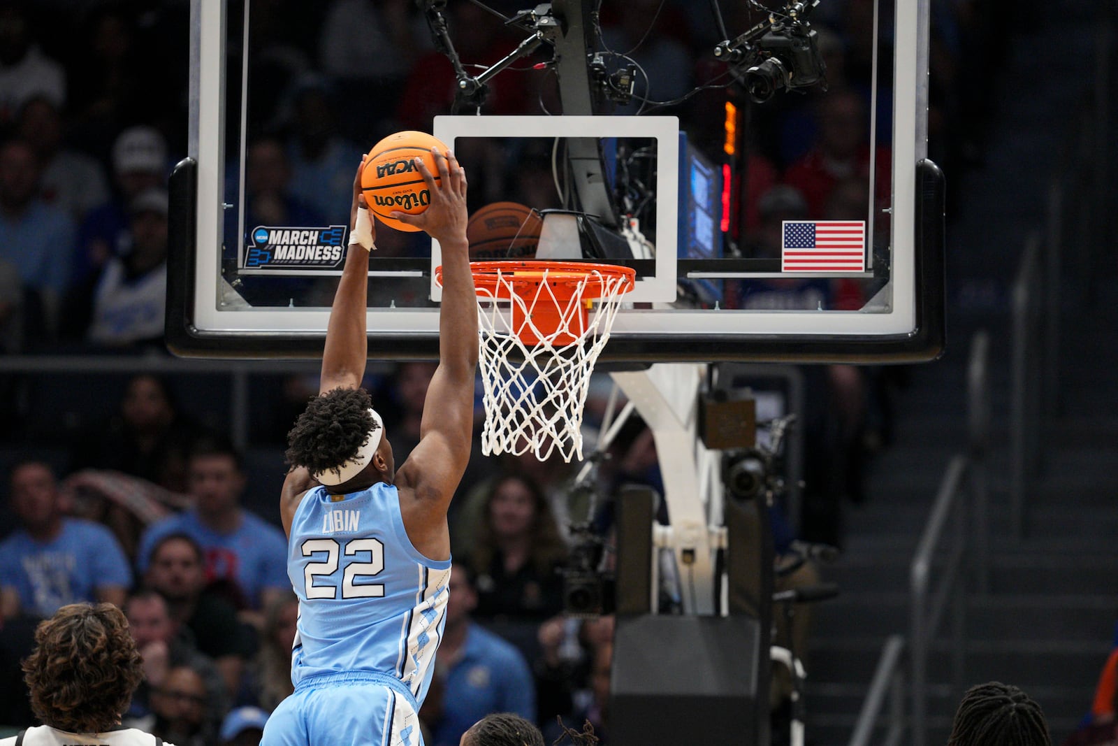 North Carolina forward Ven-Allen Lubin dunks during the first half of a First Four college basketball game against San Diego State in the NCAA Tournament, Tuesday, March 18, 2025, in Dayton, Ohio. (AP Photo/Jeff Dean)