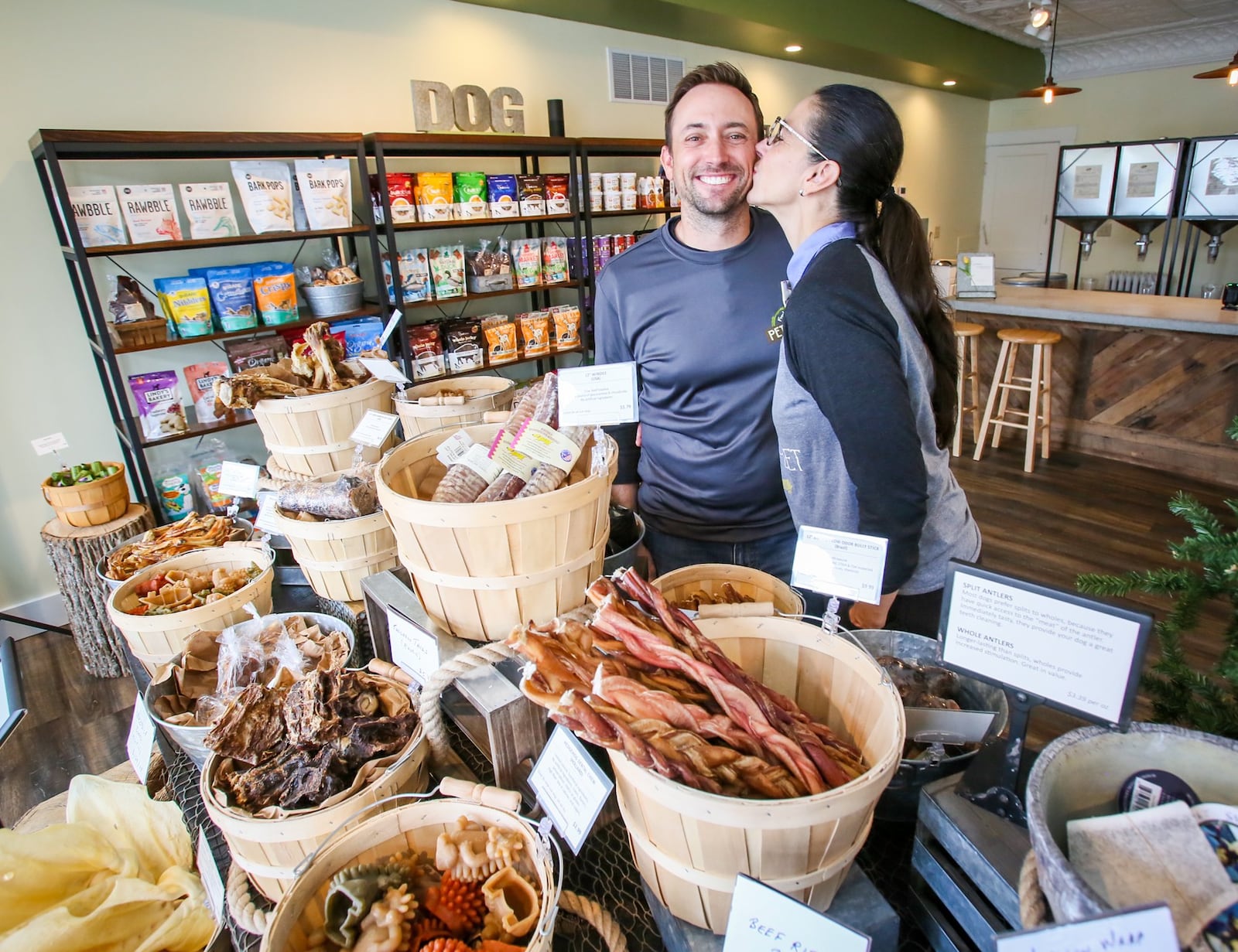 Chris Miller and Rachel Steinman, owners of Pet Wants Hamilton, in their 139 Main St. store, Thursday, Sept. 14, 2017. GREG LYNCH / STAFF