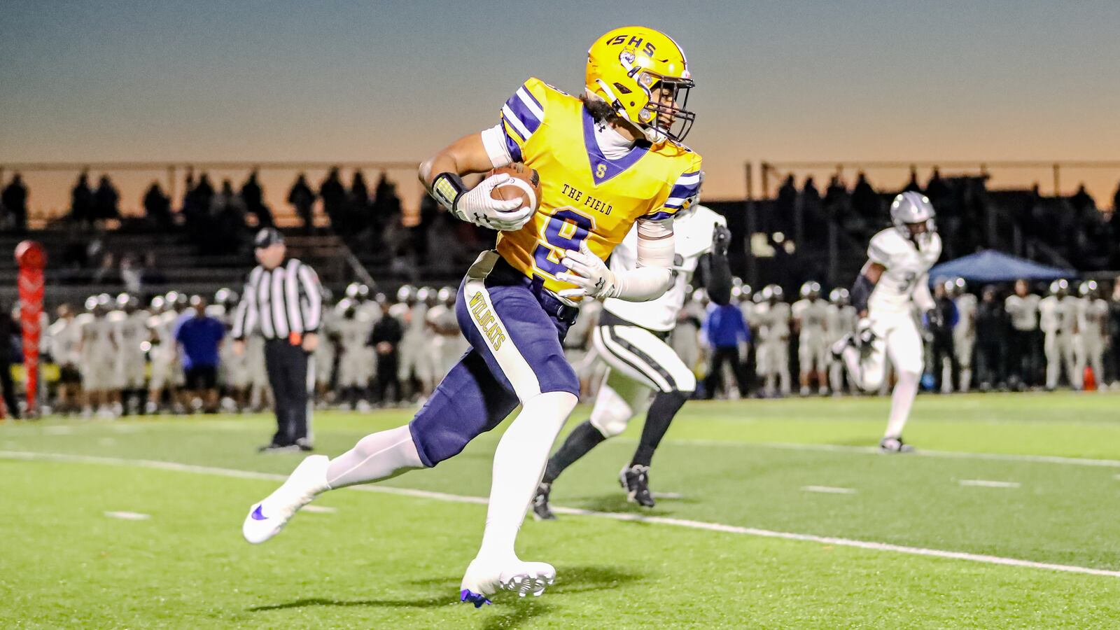 Springfield High School senior Zy'Aire Fletcher runs the ball after catching a pass during their game against Hilliard Bradley on Friday night in Springfield. The Jaguars won 34-40. Michael Cooper/CONTRIBUTED