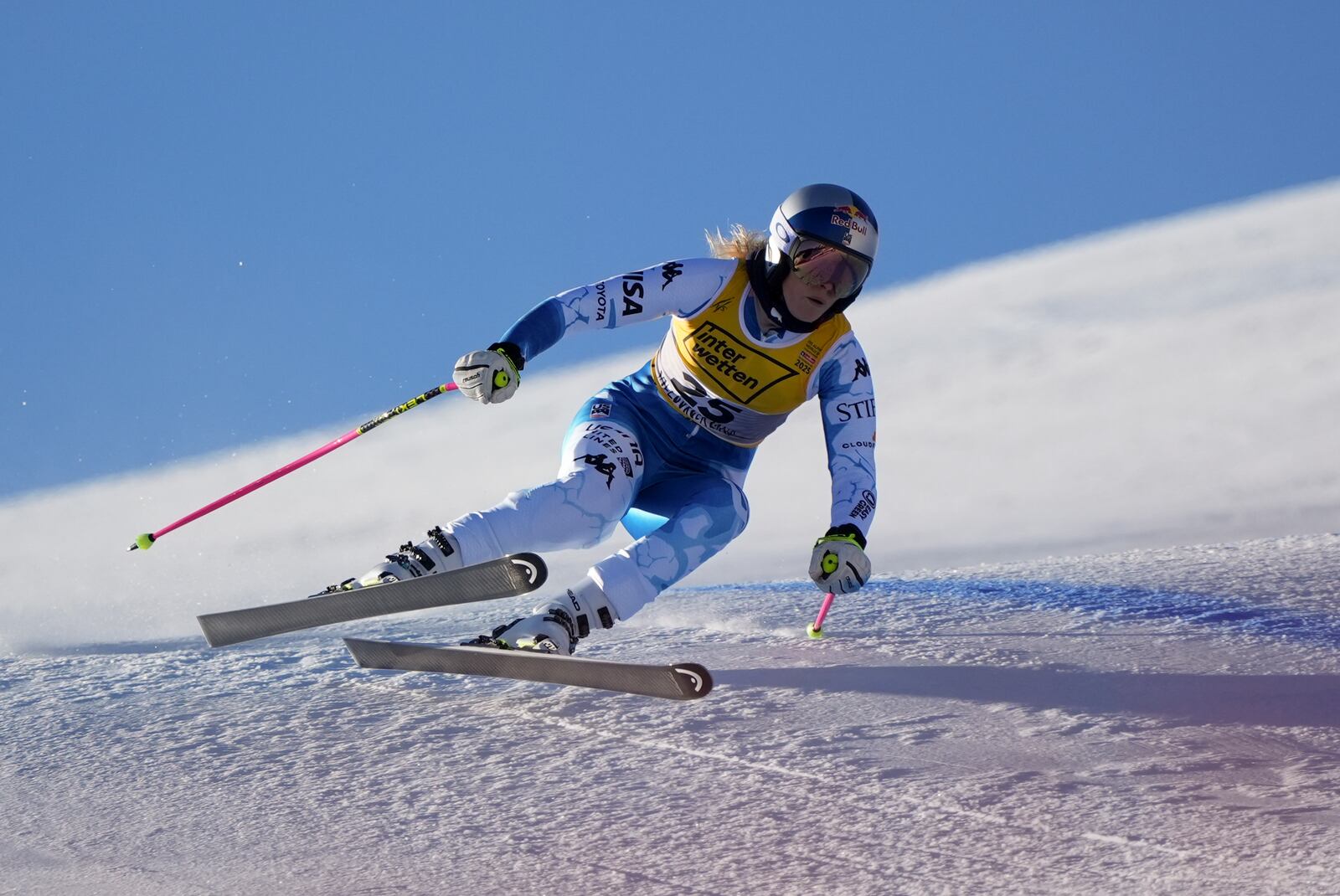 United States' Lindsey Vonn speeds down the course during a women's downhill training, at the Alpine Ski World Championships, in Saalbach-Hinterglemm, Austria, Wednesday, Feb. 5, 2025. (AP Photo/Giovanni Auletta)