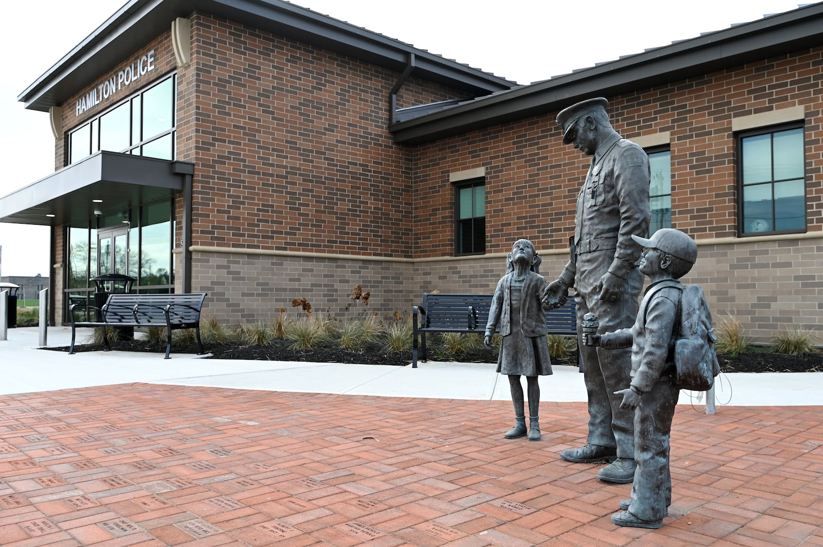 The Hamilton Police Department has begun the move-in process to the 64,000-square-foot, $32 million Hamilton Justice Center that spans from South 8th Street to Hanover Street, and sits across from the Butler County Sheriff's Office. The police department will move in this month and the courts will move in early 2025. MICHAEL D. PITMAN/STAFF