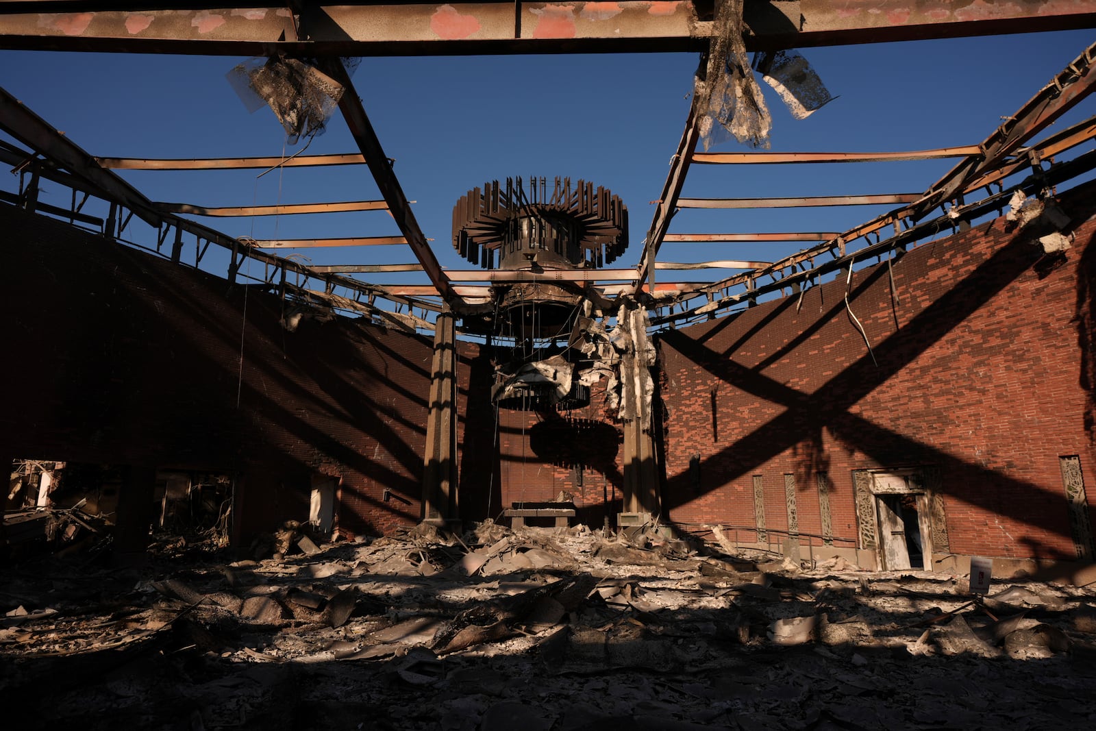 Corpus Christi Church destroyed by the Palisades Fire is seen in Palisades, Calif., Wednesday, Jan. 15, 2025. (AP Photo/Jae C. Hong)