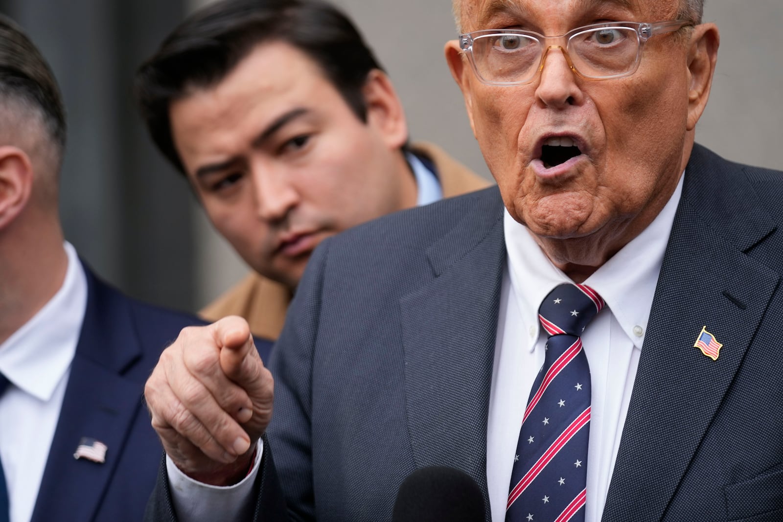 Rudy Giuliani speaks to reporters as he leaves the federal courthouse in New York, Tuesday, Nov. 26, 2024. (AP Photo/Seth Wenig)