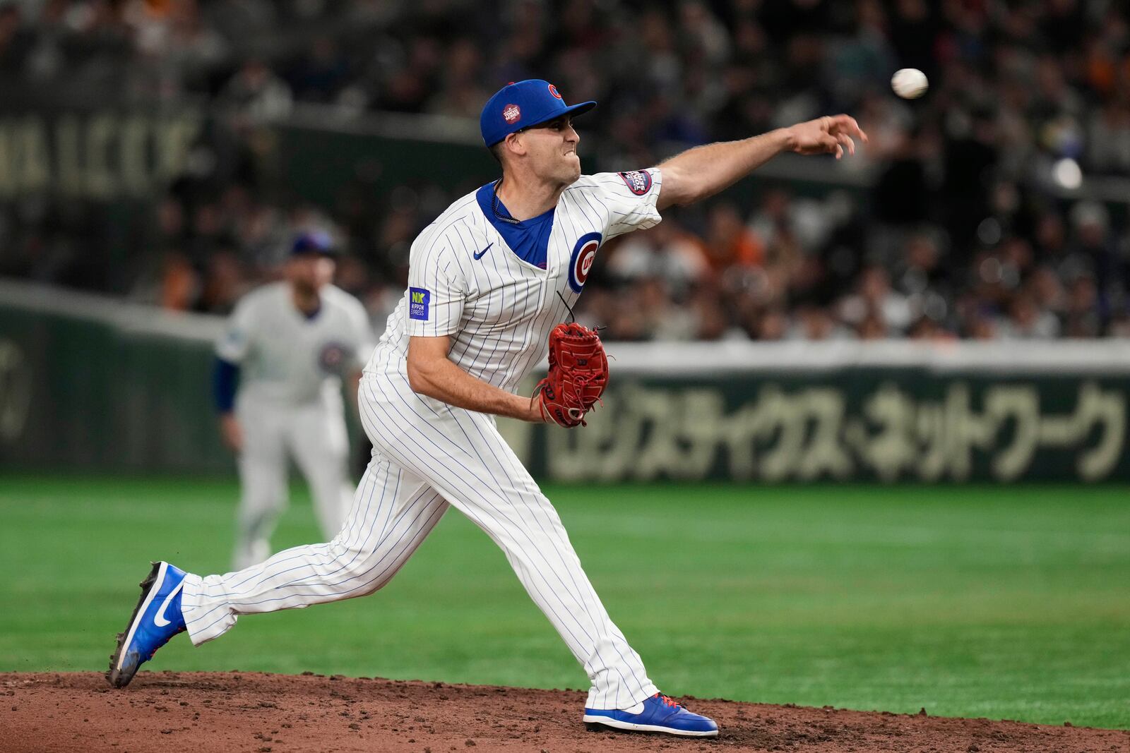 Chicago Cubs pitcher Matthew Boyd throws to the Yomiuri Giants in the sixth inning of an MLB Japan Series exhibition baseball game in Tokyo, Japan, Sunday, March 16, 2025. (AP Photo/Eugene Hoshiko)