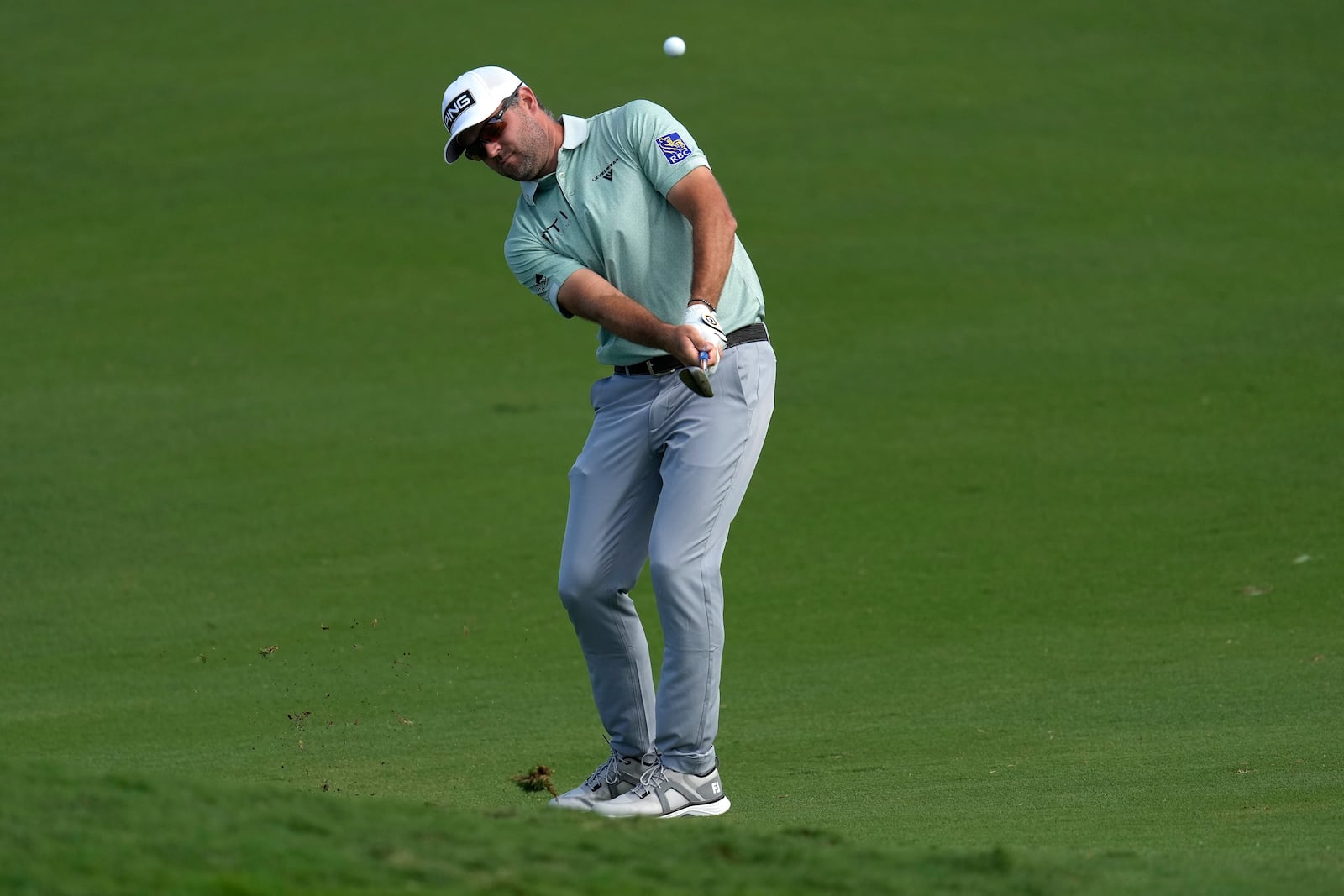 Corey Conners, of Canada, hits from the 12th fairway during the first round of The Sentry golf event, Thursday, Jan. 2, 2025, at Kapalua Plantation Course in Kapalua, Hawaii. (AP Photo/Matt York)