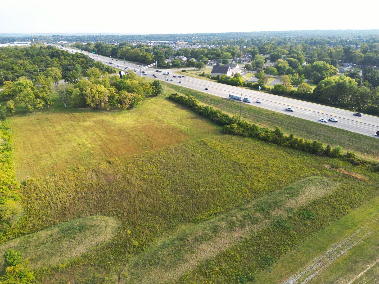 Pictured is the land along Bypass Ohio 4 and Hamilton-Mason Road, where a new 1 million-gallon water tower will be constructed. It will take about 18 months for construction, which includes underground infrastructure. The tower will serve the businesses in Enterprise Park and nearby Hamilton residential water customers. NICK GRAHAM/STAFF