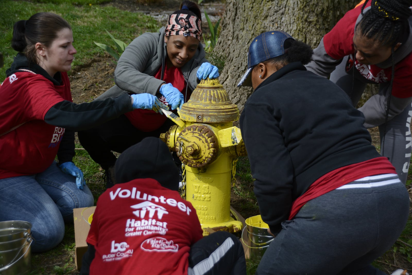 Fairfield Twp. will renew its annual spring cleanup day on April 10 in conjunction with Habitat for Humanity's Rock the Block program, though Habitat's community projects will span the Greater Cincinnati region. Pictured is work during Habitat for Humanity’s Rock the Block in April 2019 in Fairfield Twp. During that event, hundreds of volunteers filled more than 11 Dumpsters with trash and debris from the Five Points area. MICHAEL D. PITMAN/FILE