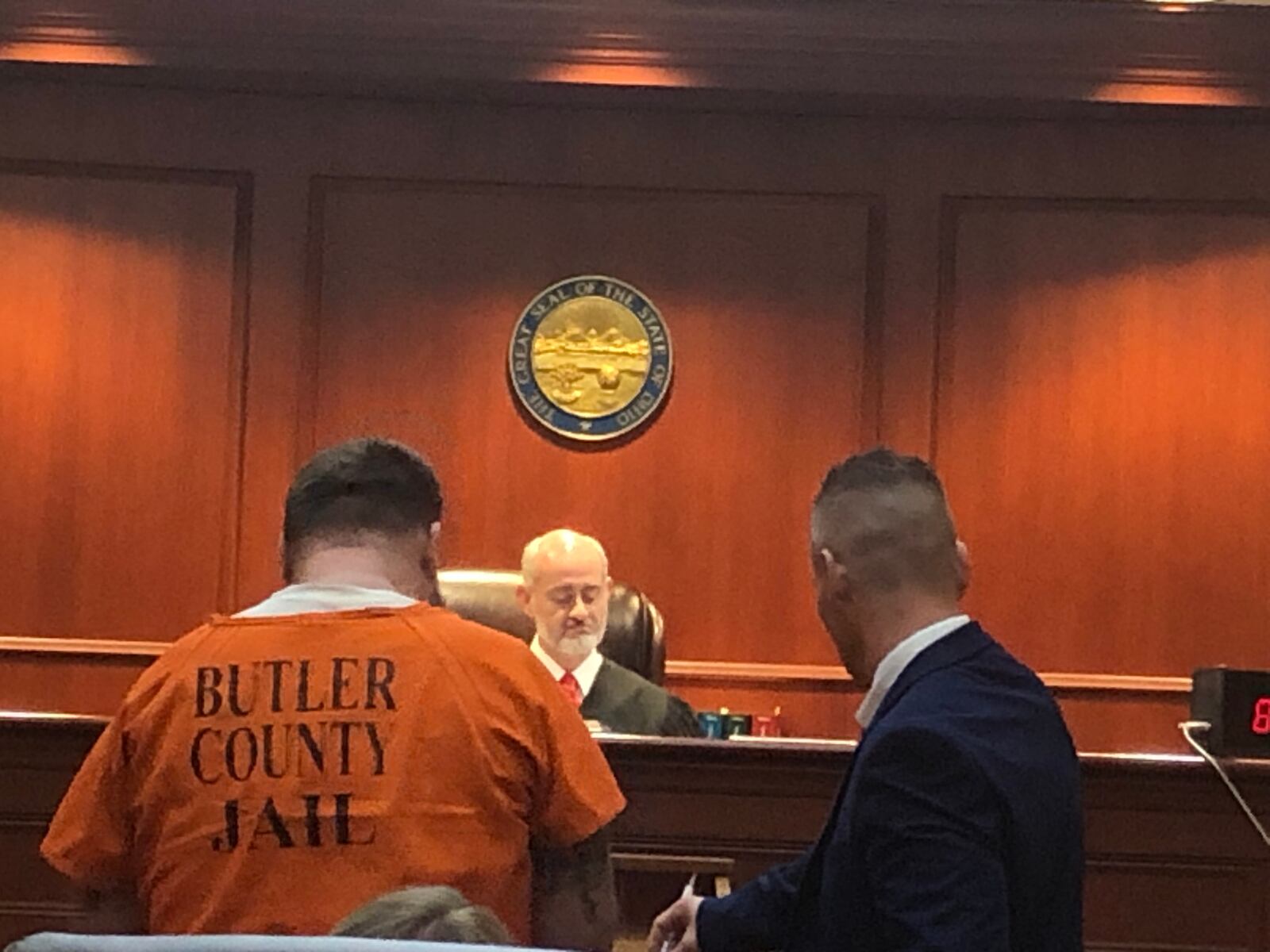 Michael Maloney, 42, of Hamilton, and his attorney Ched Peck, stand before Butler County Common Pleas Judge Greg Stephens Monday morning. RICK McCRABB/STAFF