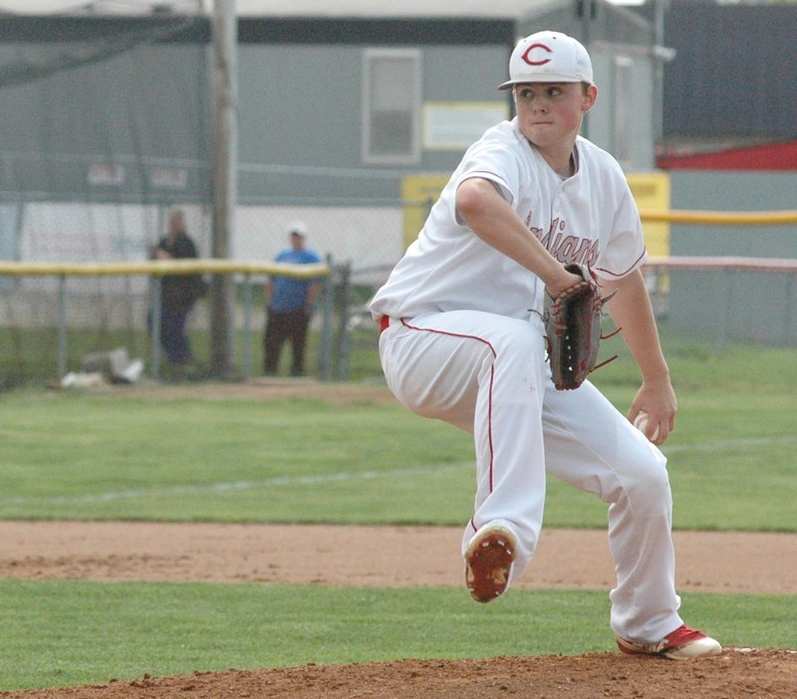 Carlisle’s Sam Rawlins winds up to throw a pitch April 29 during a Southwestern Buckeye League Buckeye Division baseball game against Waynesville at Carlisle’s Sam Franks Field. Waynesville won 7-0. RICK CASSANO/STAFF