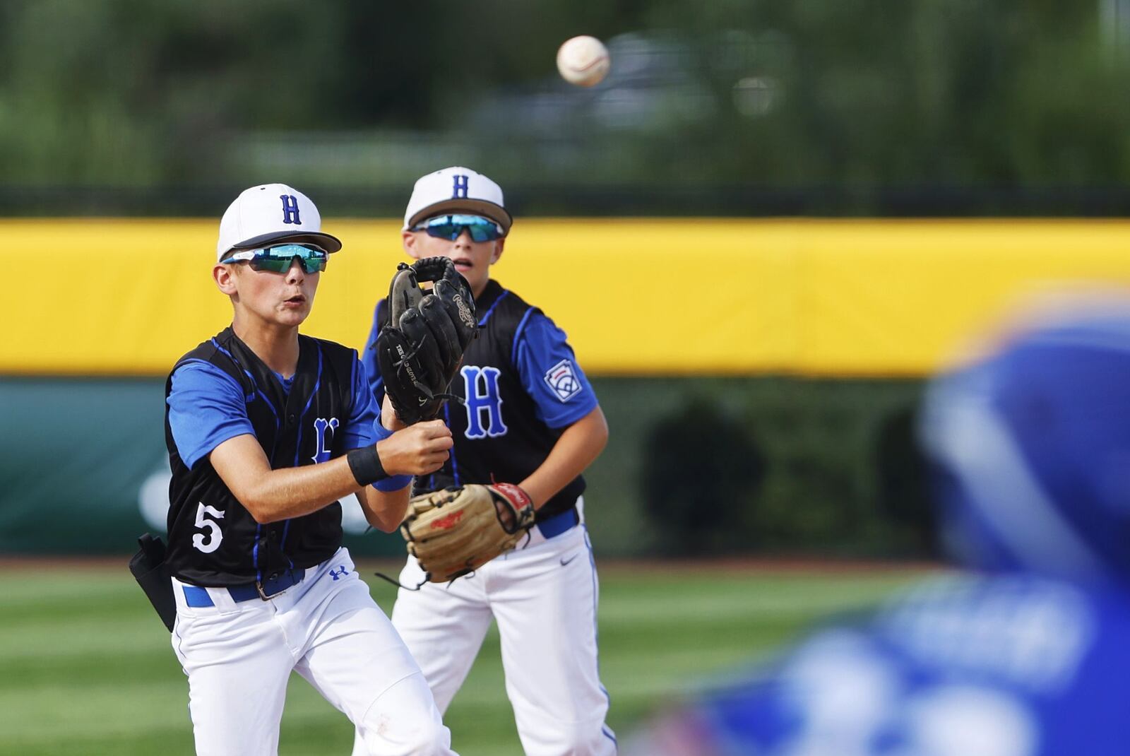 Hamilton West Side Little League's Blake Sams makes a throw to first base during their 1-0 loss to Kentucky's North Laurel Little League in a Great Lakes Region elimination baseball game Wednesday, Aug. 10, 2022 at the Little League Central Region Complex in Whitestown, IN. NICK GRAHAM/STAFF