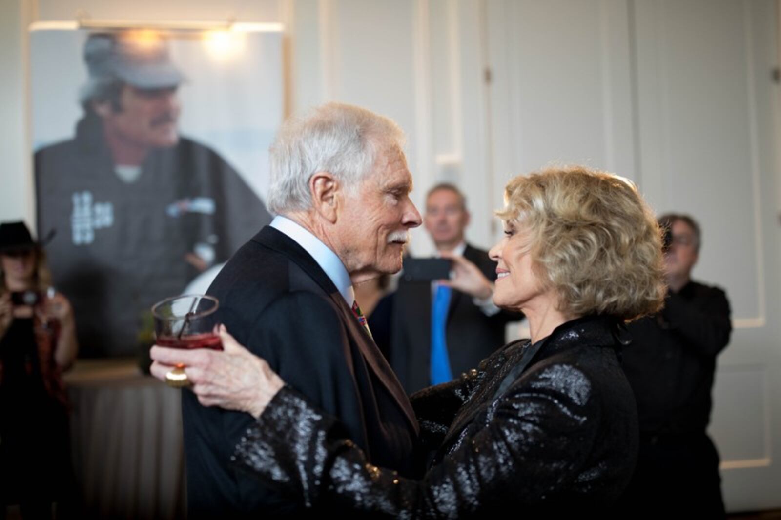 Ted Turner embraces his ex-wife Jane Fonda during his 80th birthday party at the St. Regis Atlanta hotel on Saturday, Nov. 17, 2018. Fonda said of her former husband: 'You are a good man, Ted Turner, and the world is a better place because of you.'