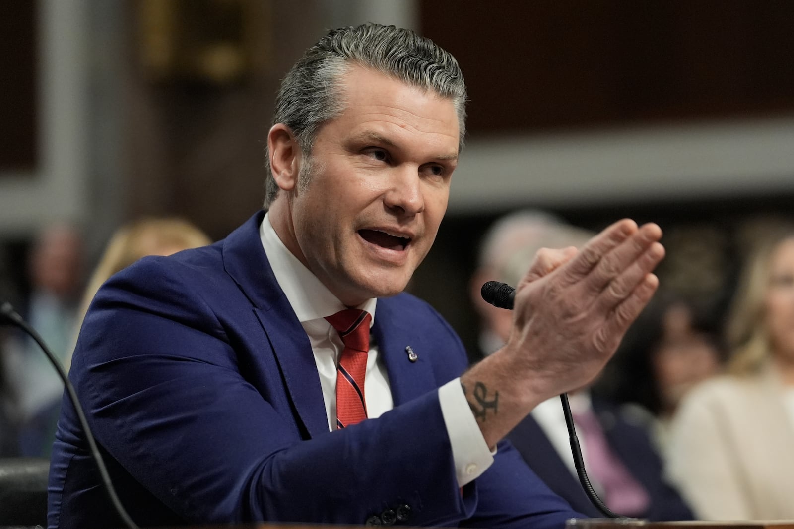 Pete Hegseth, President-elect Donald Trump's choice to be Defense secretary, appears before the Senate Armed Services Committee for his confirmation hearing, at the Capitol in Washington, Tuesday, Jan. 14, 2025. (AP Photo/J. Scott Applewhite)