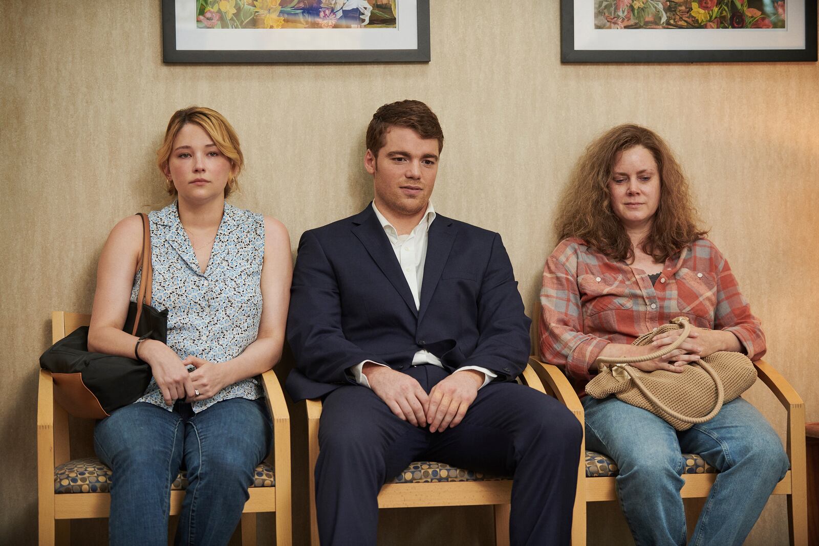 Haley Bennett (left, as Lindsay), Gabriel Basso (as J.D. Vance) and Amy Adams ( as Bev) in "Hillbilly Elegy." LACEY TERRELL / NETFLIX