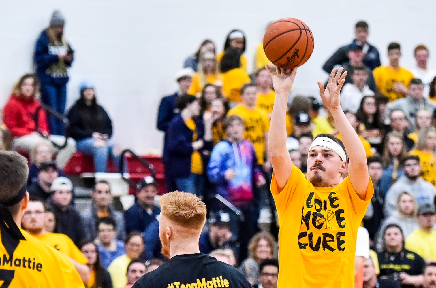 Two Butler County schools hold basketball game to benefit Madison teen battling cancer