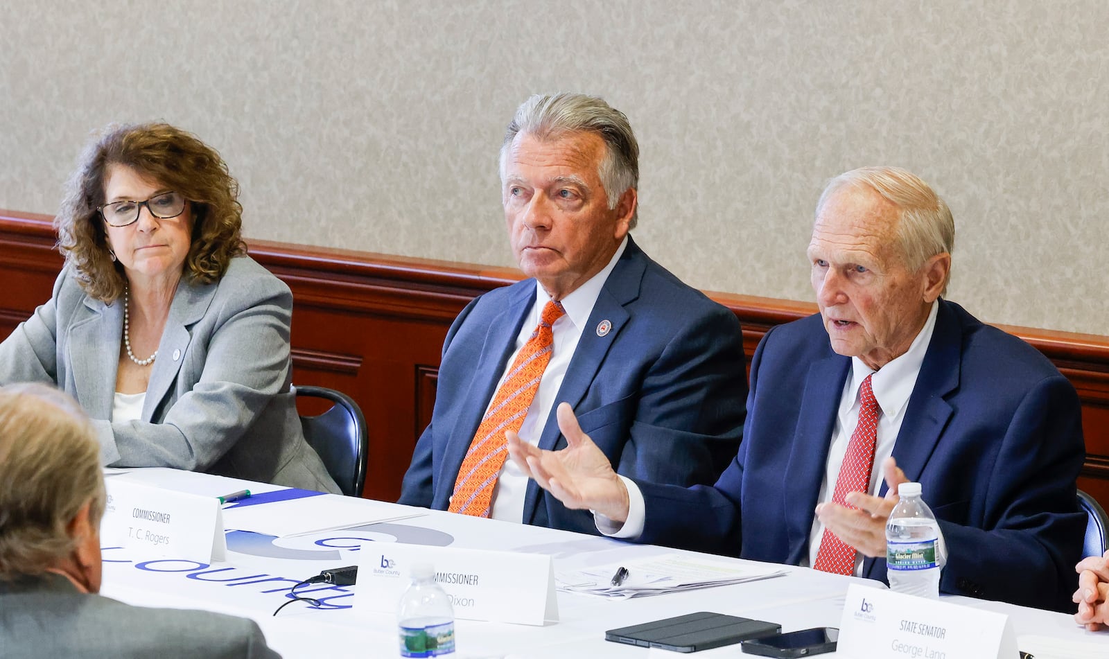 Butler County Commissioners Cindy Carpenter, left, T.C. Rogers, middle, and Don Dixon, held a follow-up summit to discuss property taxes with state legislators and other elected officials Monday, June 24, 2024 in Hamilton. NICK GRAHAM/STAFF