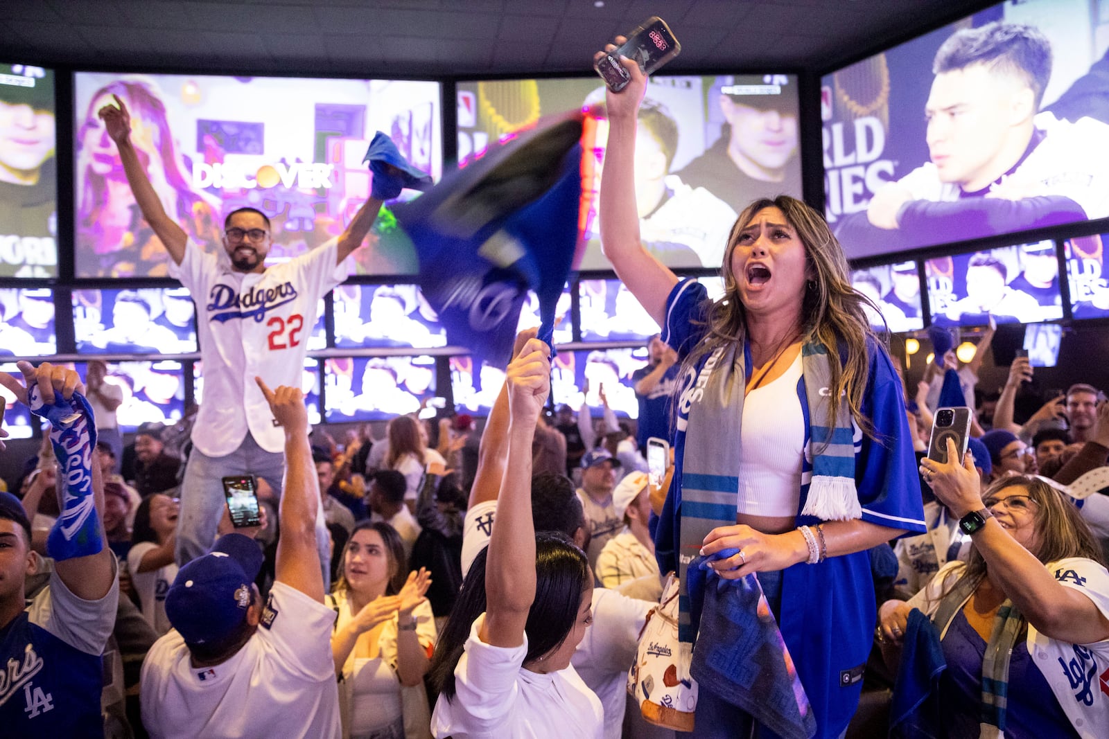 Fans celebrate after the Los Angeles Dodgers won against the New York Yankees in the baseball World Series Wednesday, Oct. 30, 2024, in Los Angeles.