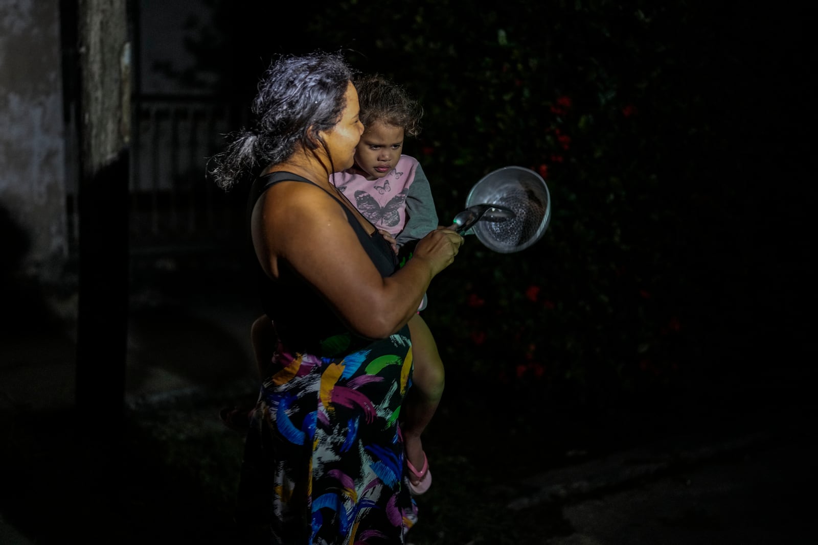 Residents protest by banging pots and pans in Havana, Cuba, Sunday, Oct. 20, 2024. (AP Photo/Ramon Espinosa)