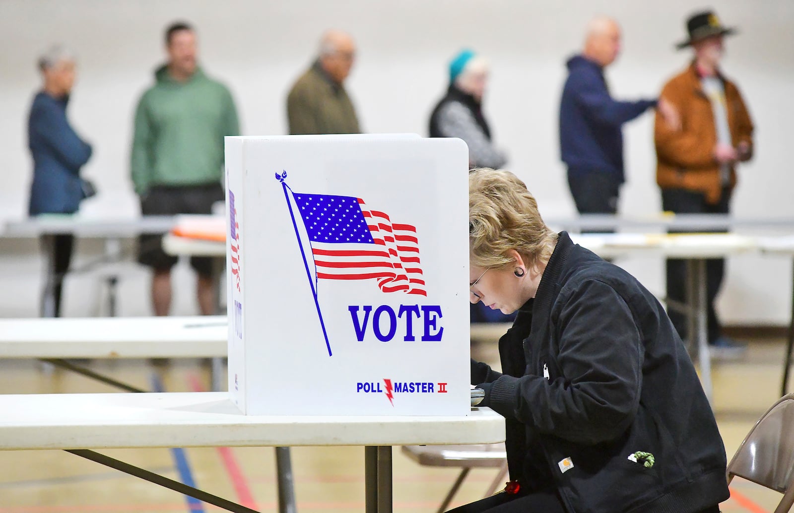 FILE - Melissa Warner, of Johnstown, Pa., marks her ballot on Election Day at Westmont Borough No. 1 polling place at Westmont Grove in Cambria County, Tuesday, Nov. 5, 2024. (Thomas Slusser/The Tribune-Democrat via AP, File)