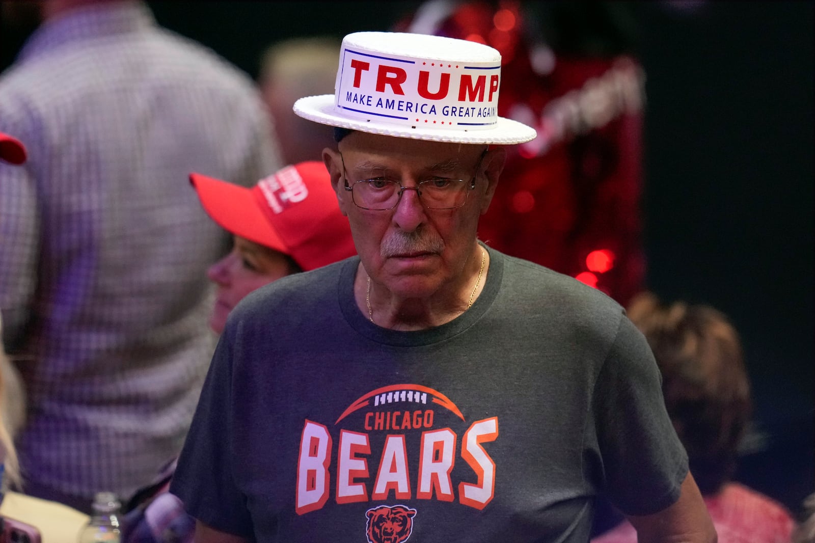 A supporter arrives before Republican presidential nominee former President Donald Trump speaks at a campaign rally at the Findlay Toyota Arena Sunday, Oct. 13, 2024, in Prescott Valley, Ariz. (AP Photo/Ross D. Franklin)