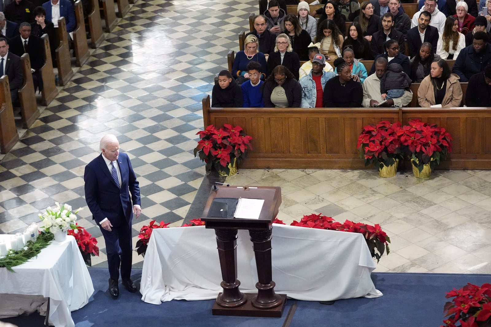 President Joe Biden walks to the podium to speak during an interfaith prayer service for the victims of the deadly New Years truck attack, at St. Louis Cathedral in New Orleans, Monday, Jan. 6, 2025. (AP Photo/Stephanie Scarbrough)