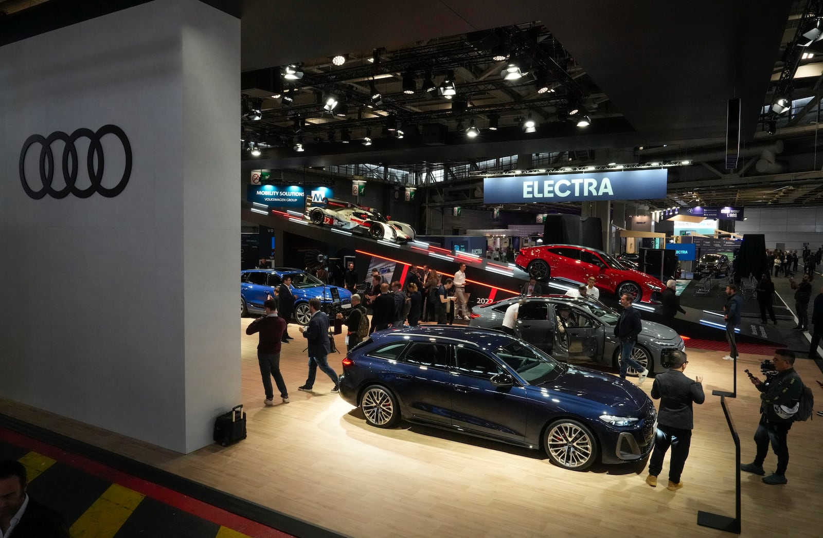 Audi electric cars are presented at the Paris Auto Show, in Paris, Monday, Oct. 14, 2024. (AP Photo/Michel Euler)