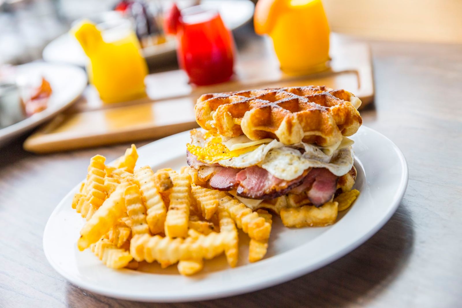 One of the featured meals at Toast & Berry is a Waffle and Pork Sandwich. Toast & Berry has two locations in Liberty Center in Liberty Twp., Butler County, Ohio. CONTRIBUTED