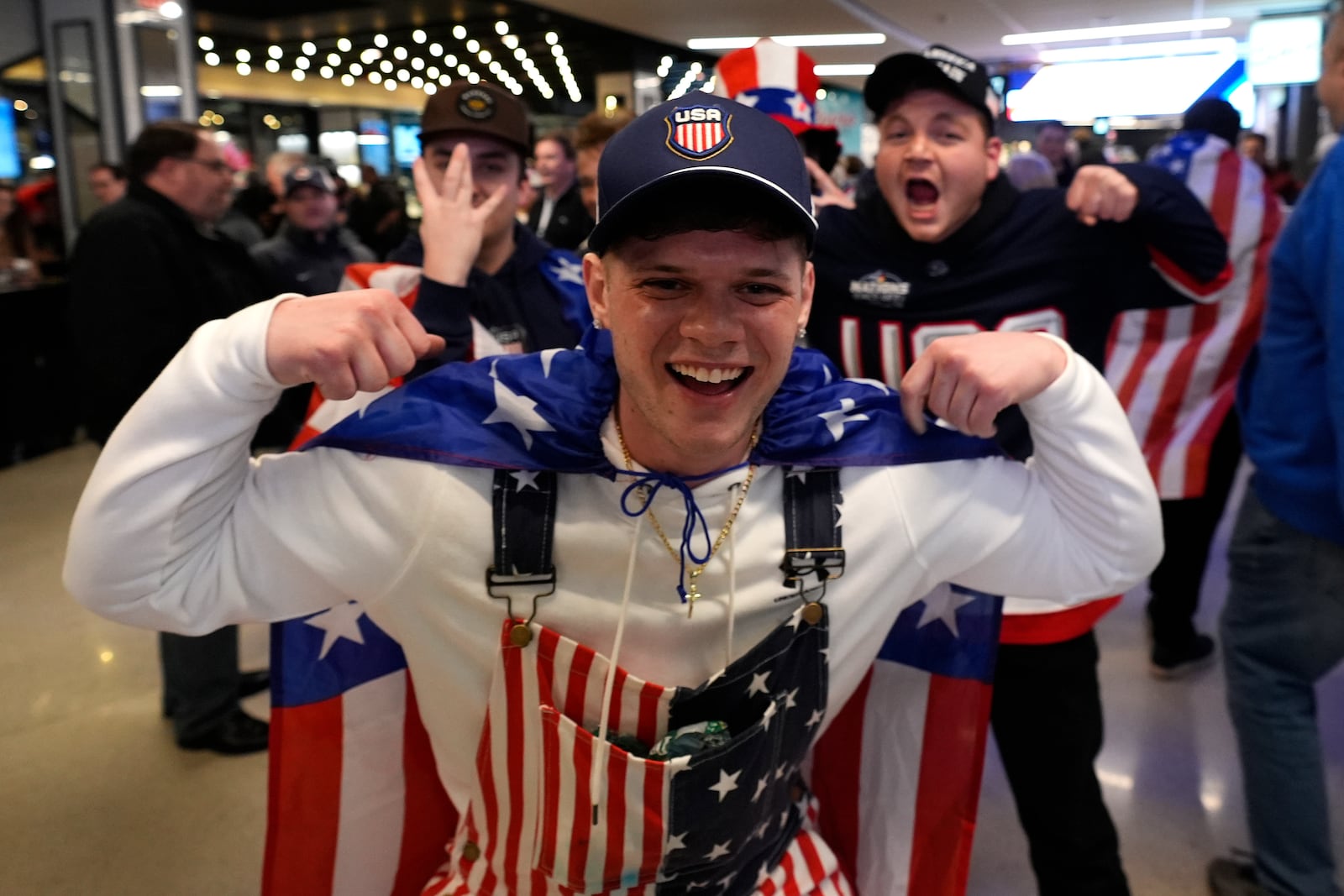 United States fans rally prior to the 4 Nations Face-Off championship hockey game against Canada, Thursday, Feb. 20, 2025, in Boston. (AP Photo/Charles Krupa)