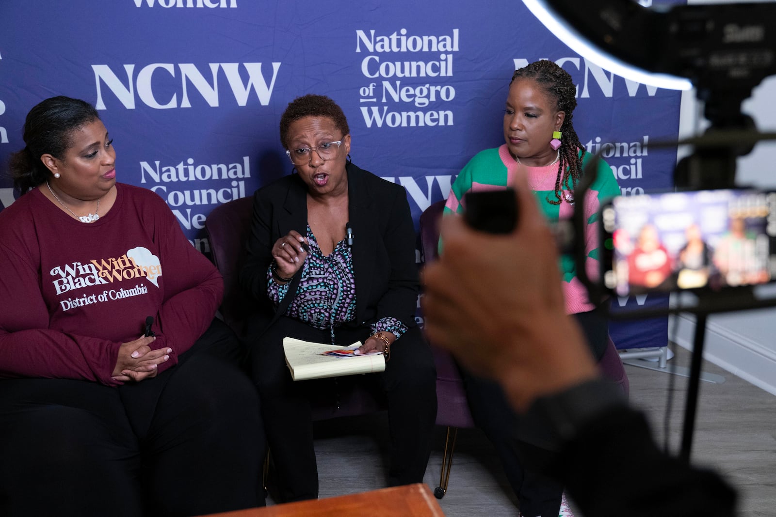 Members of the Black Women's Leadership Collective from left; Holli Holliday, President, Sisters Lead Sisters Vote & lead organizer, Win With Black Women, Portia Reddick White, Vice President Advocacy and Policy, National Council of Negro Women (NCNW) and Roslyn Brock, Chairman Emeritus, NAACP, share election updates and voting information in battleground communities via livestream at the national Council of Negro Women in Washington, Tuesday, Nov. 5, 2024. (AP Photo/Jose Luis Magana)