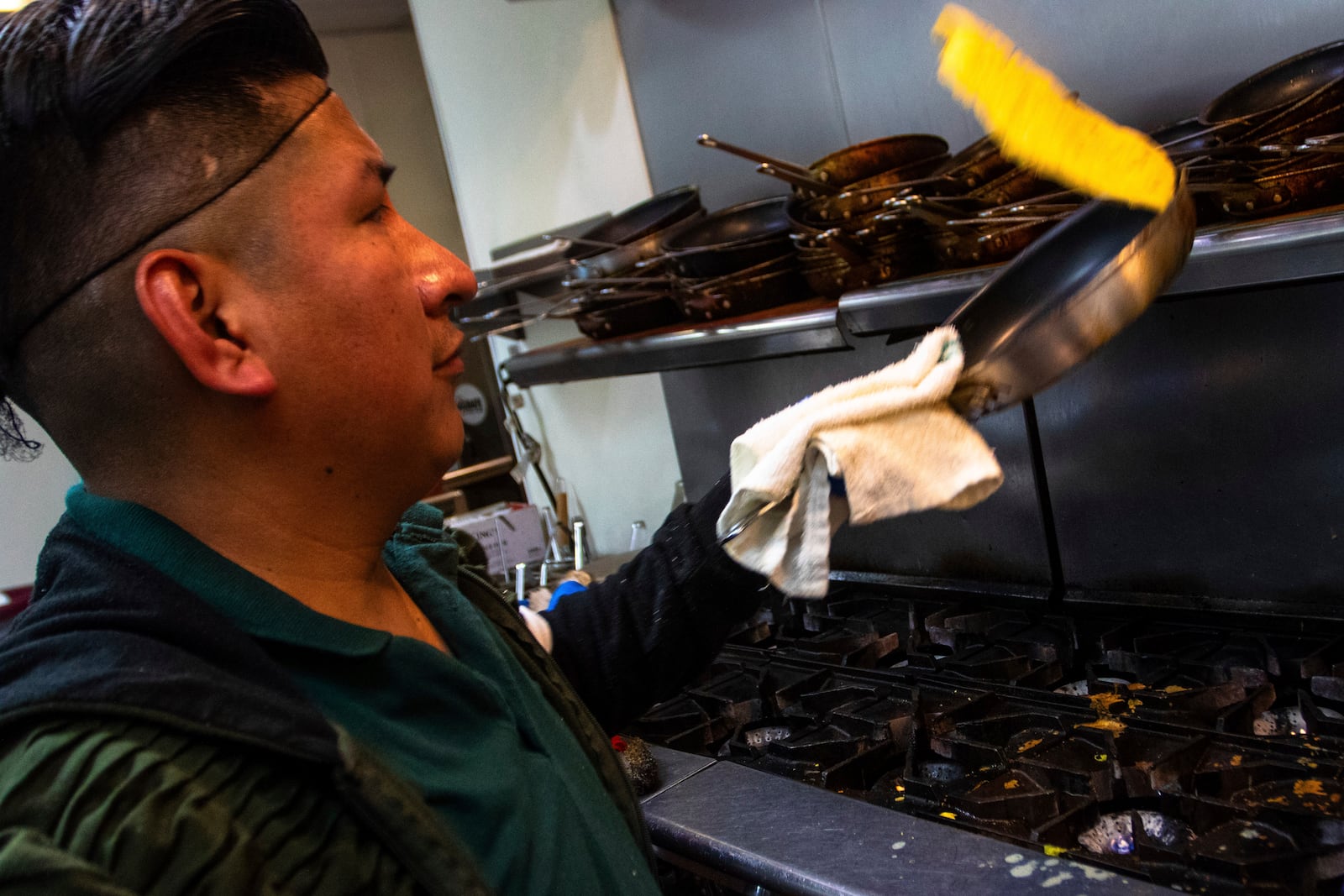 Chef Pato Aianel makes an omelet at Eggs Works restaurant Thursday, Feb. 13, 2025, in Las Vegas. (AP Photo/Ty ONeil)