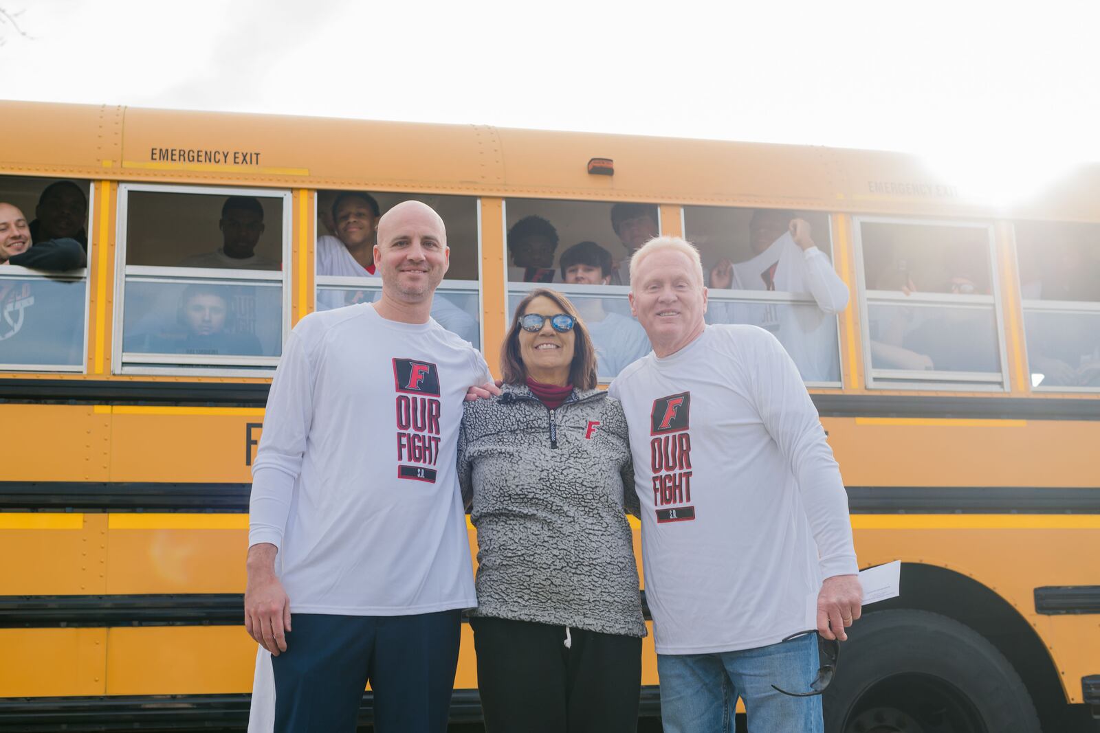 Sharon Revel and her family visited with the Fairfield High School boys basketball team players when their bus rolled by her home for a surprise visit last weekend ahead of a game they were playing in Dayton. CONTRIBUTED