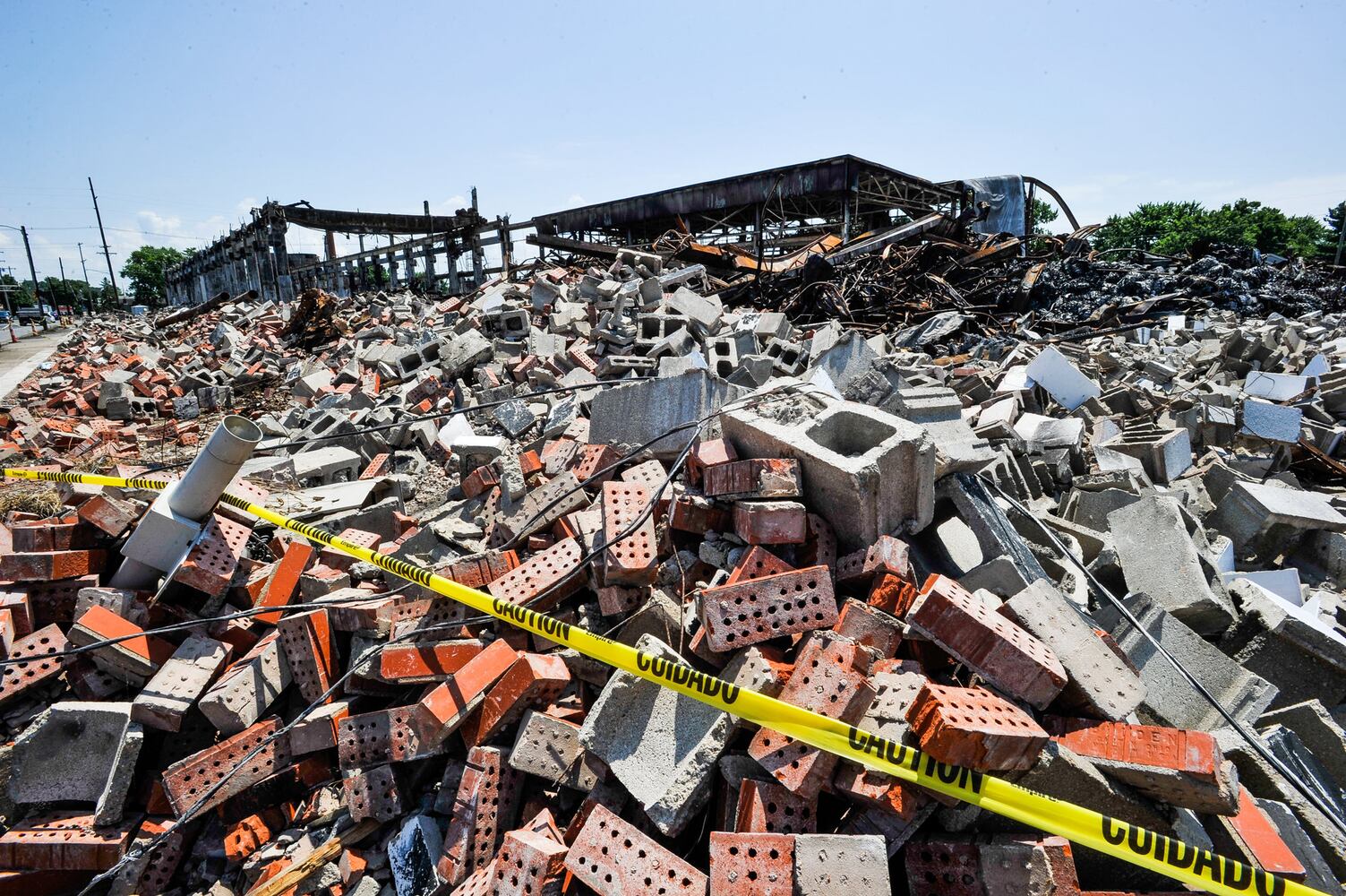 Crews demolish warehouse after massive fire in Hamilton