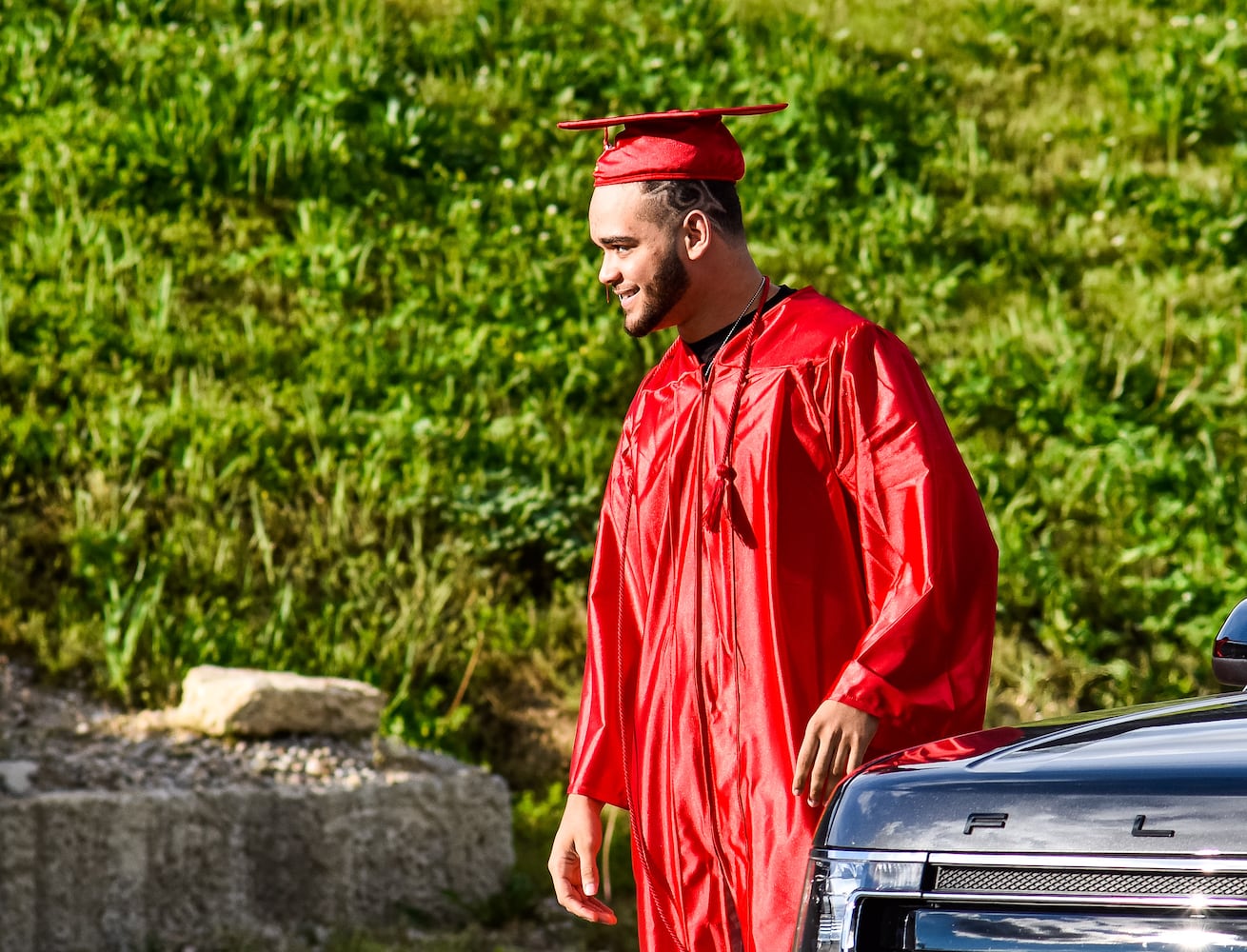 Madison High School drive-thru graduation ceremony at Land of Illusion