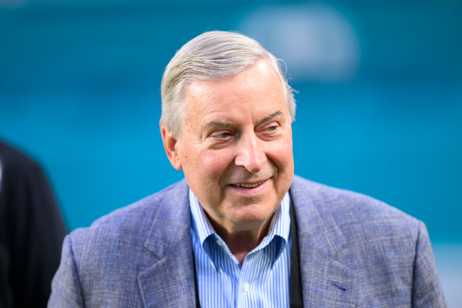 FILE - Buffalo Bills owner Terry Pegula smiles on the field before an NFL football game between the Buffalo Bills and the Miami Dolphins, Thursday, Sept. 12, 2024, in Miami Gardens, Fla. (AP Photo/Doug Murray, FIle)