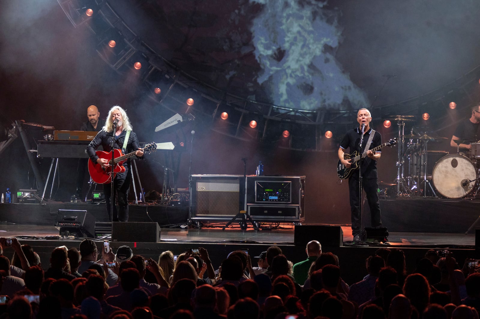 FILE - Roland Orzabal, left, and Curt Smith, right, of Tears for Fears, perform at Ameris Bank Amphitheatre on Sunday, June 12 2022, in Alpharetta, Ga. (Photo by Paul R. Giunta/Invision/AP, File)