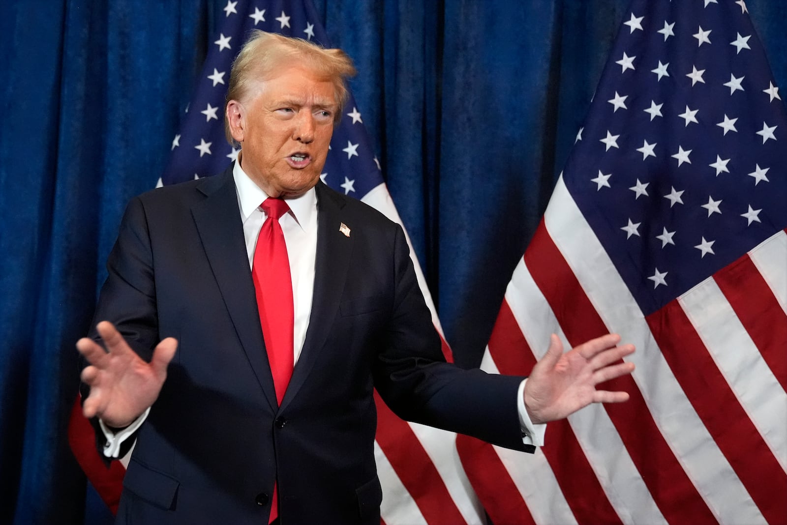 Republican presidential nominee former President Donald Trump talks backstage before he speaks at a campaign rally at the Gaylord Rockies Resort & Convention Center, Friday, Oct. 11, 2024, in Aurora, Colo. (AP Photo/Alex Brandon)