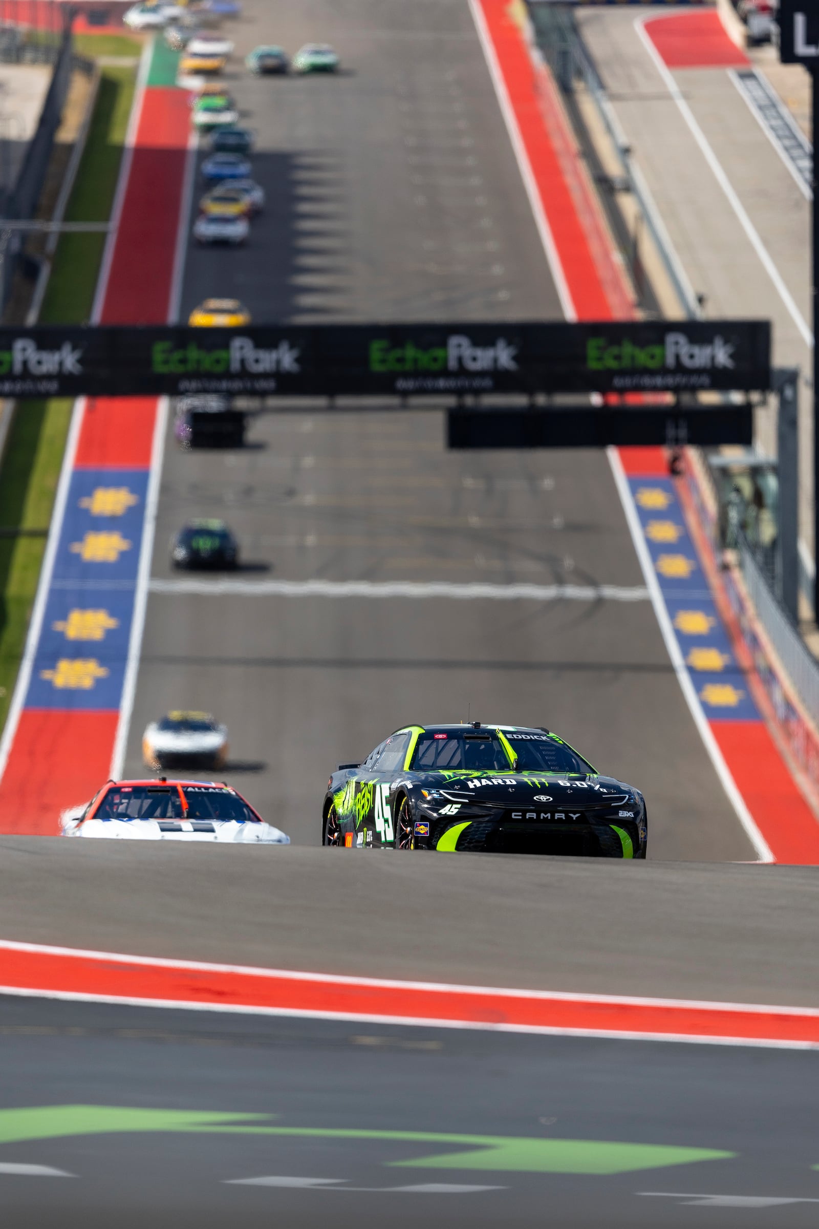 Tyler Reddick pulls into Turn 1 during a NASCAR Cup Series auto race at Circuit of the Americas in Austin, Texas, Sunday, March 2, 2025. (AP Photo/Stephen Spillman)