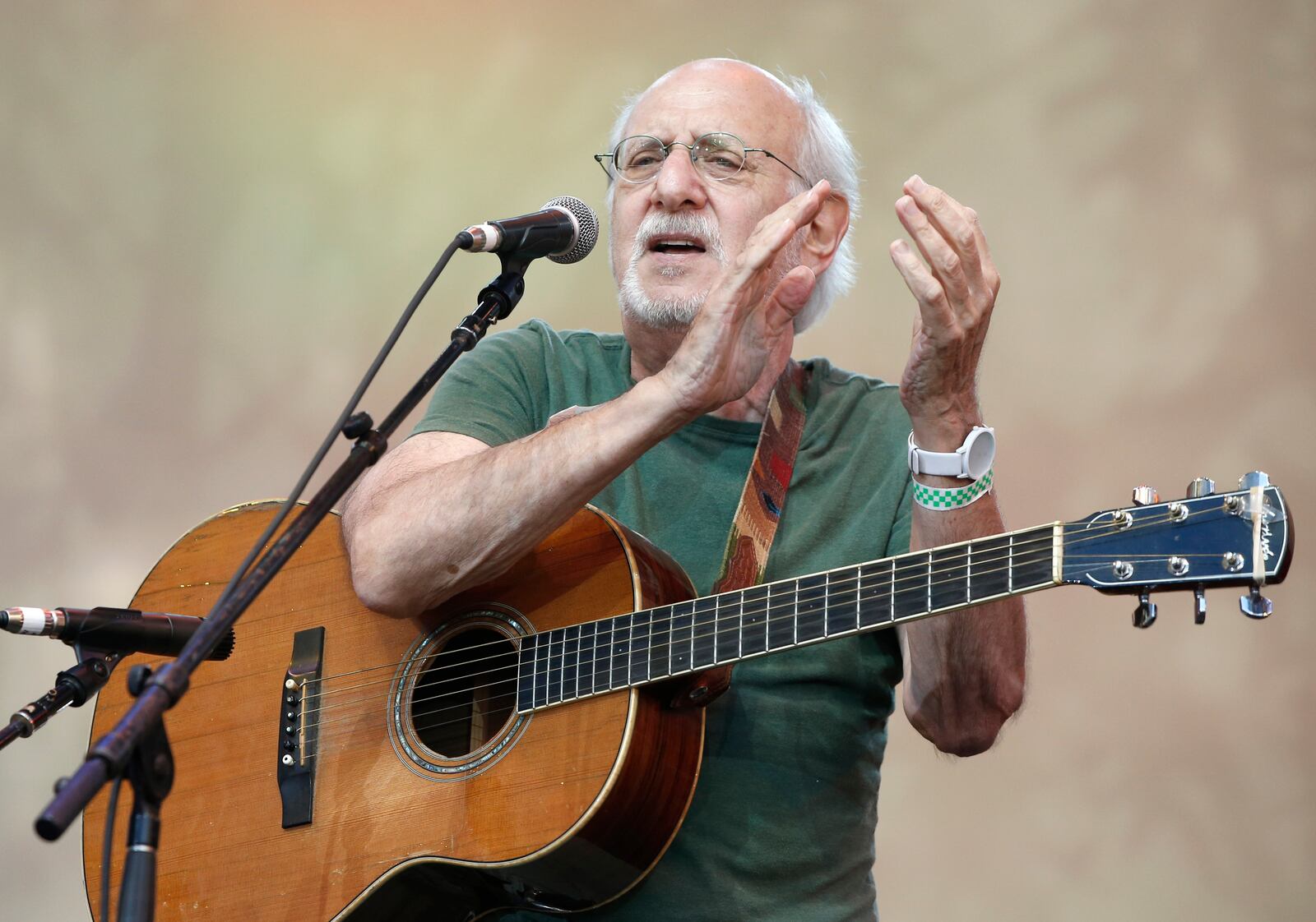 FILE - Singer-songwriter Peter Yarrow, of the 1960's era musical trio "Peter Paul and Mary," performs during a memorial tribute concert for folk icon and civil rights activist Pete Seeger in New York on July 20, 2014. (AP Photo/Kathy Willens, File)