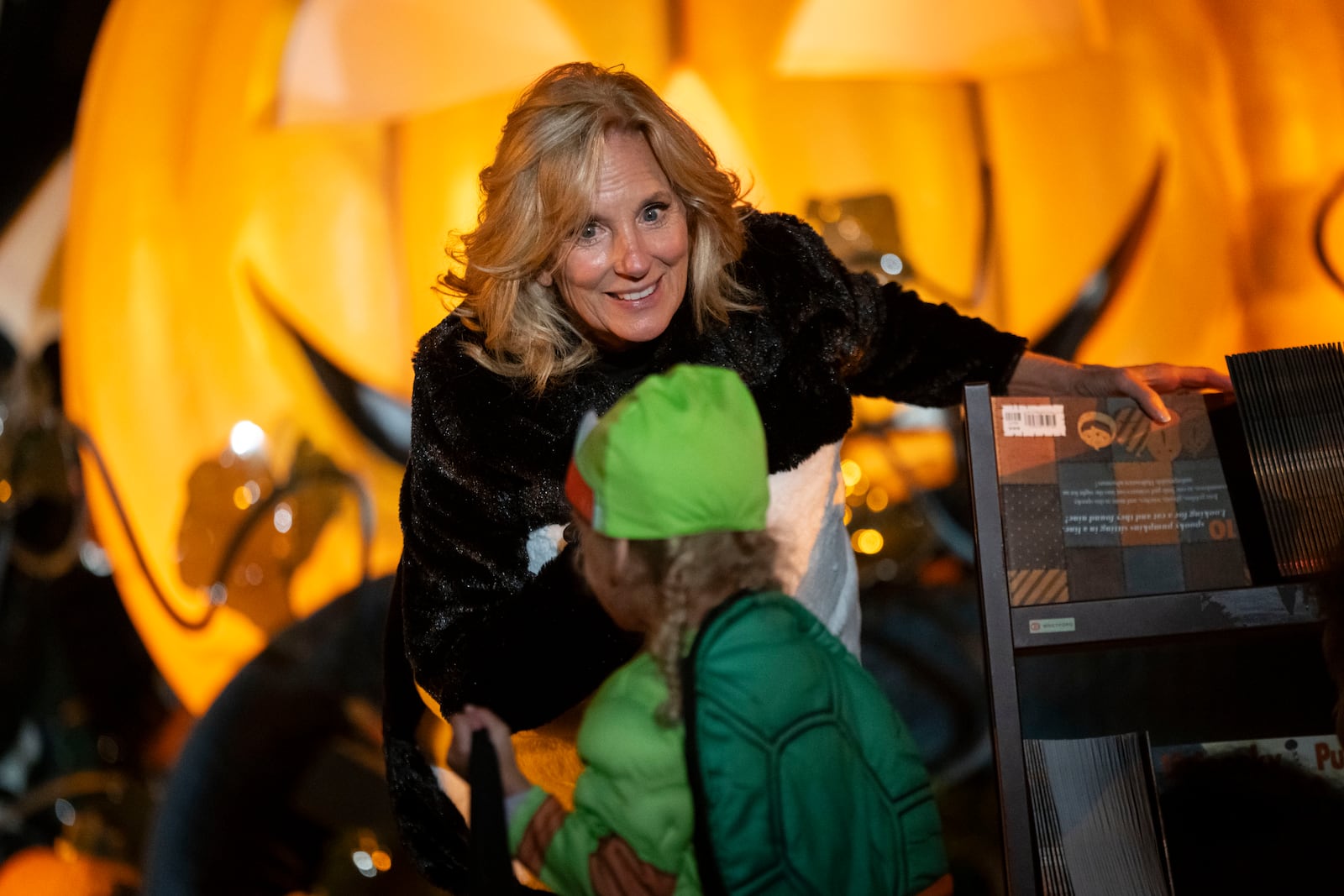 First lady Jill Biden, wearing a panda suit, hosts local area students, military-connected children, and neighborhood families for trick-or-treating, ahead of Halloween on Thursday, at the South Lawn of the White House in Washington Wednesday, Oct. 30, 2024. (AP Photo/Ben Curtis)