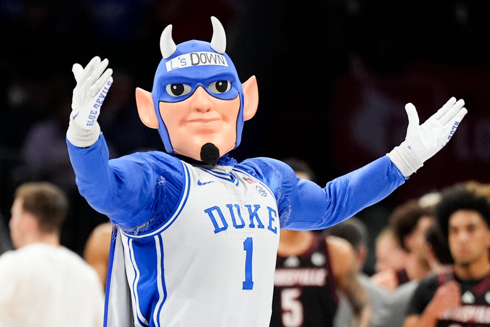 The Duke mascot performs during an NCAA college basketball game against Louisville in the championship of the Atlantic Coast Conference tournament, Saturday, March 15, 2025, in Charlotte, N.C. (AP Photo/Chris Carlson)