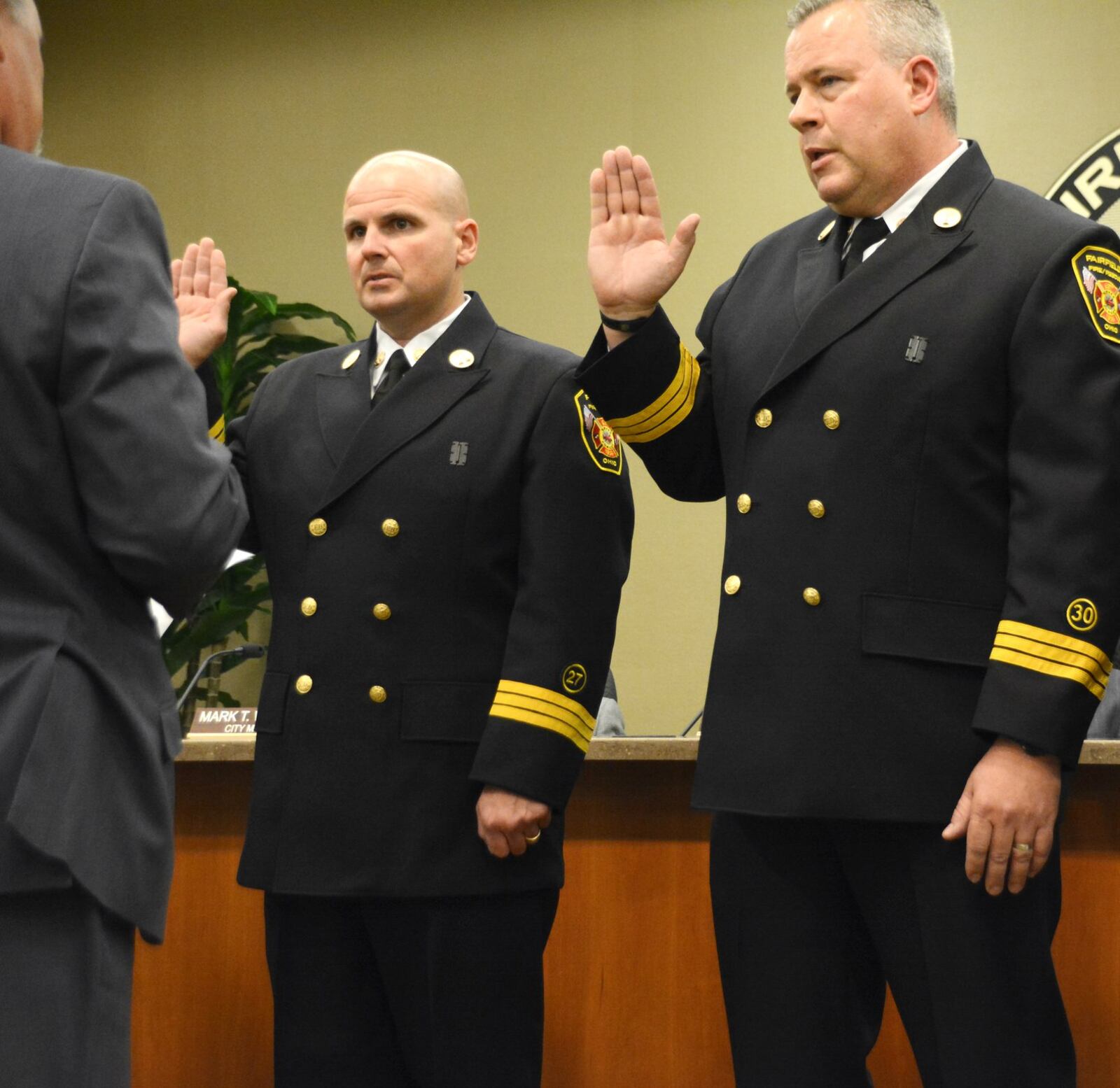 The city of Fairfield promoted Randy McCreadie, left, and Tom Wagner, right, to deputy fire chief on Wednesday evening, Oct. 11, 2017. It’s the first time the city had a deputy fire chief in a decade. MICHAEL D. PITMAN/STAFF