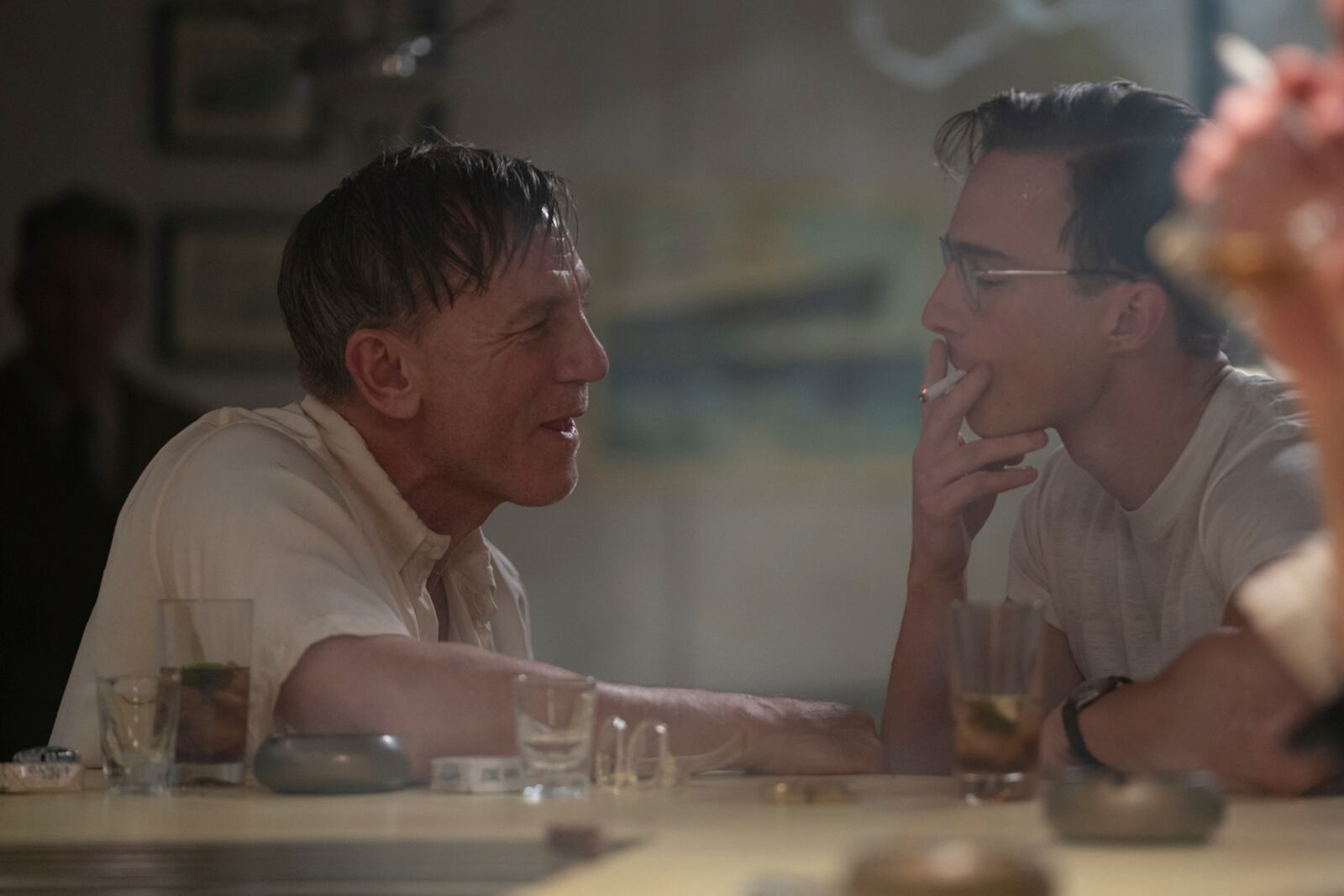 This image released by A24 shows Daniel Craig, left, and Drew Starkey in a scene from "Queer." (Yannis Drakoulidis/A24 via AP)