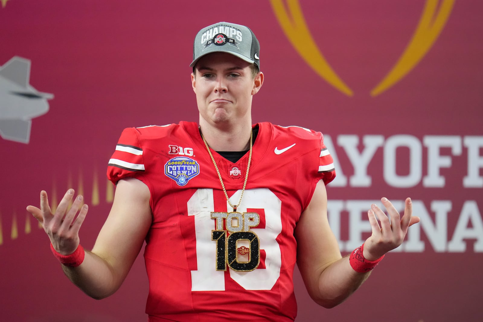 Ohio State quarterback Will Howard celebrates after the Cotton Bowl College Football Playoff semifinal game against Texas, Friday, Jan. 10, 2025, in Arlington, Texas. (AP Photo/Julio Cortez)