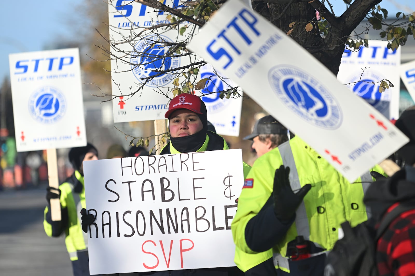 Canada Post workers picket outside a sorting plant in Montreal on Friday, Nov.15, 2024. (Graham Hughes /The Canadian Press via AP)