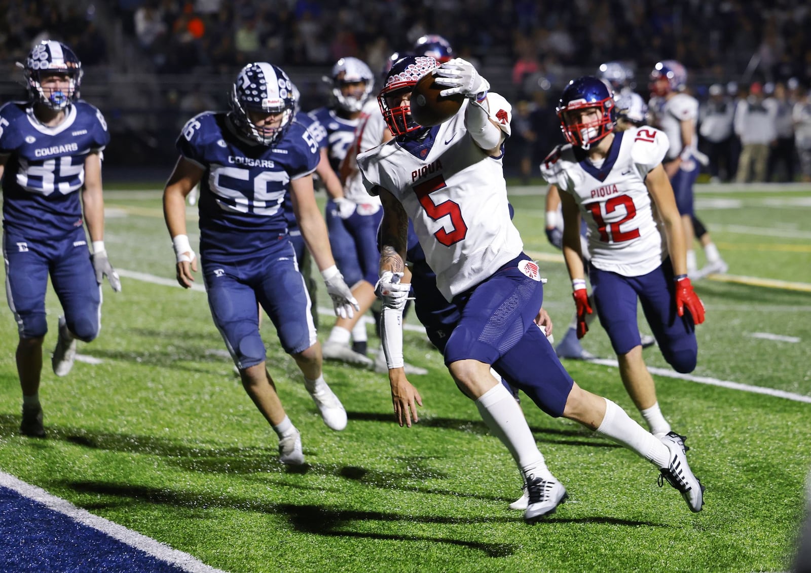 Piqua's Ky Warner begins to celebrate an impending touchdown against Edgewood at Kumler Field on Nov. 4, 2022. Nick Graham/STAFF