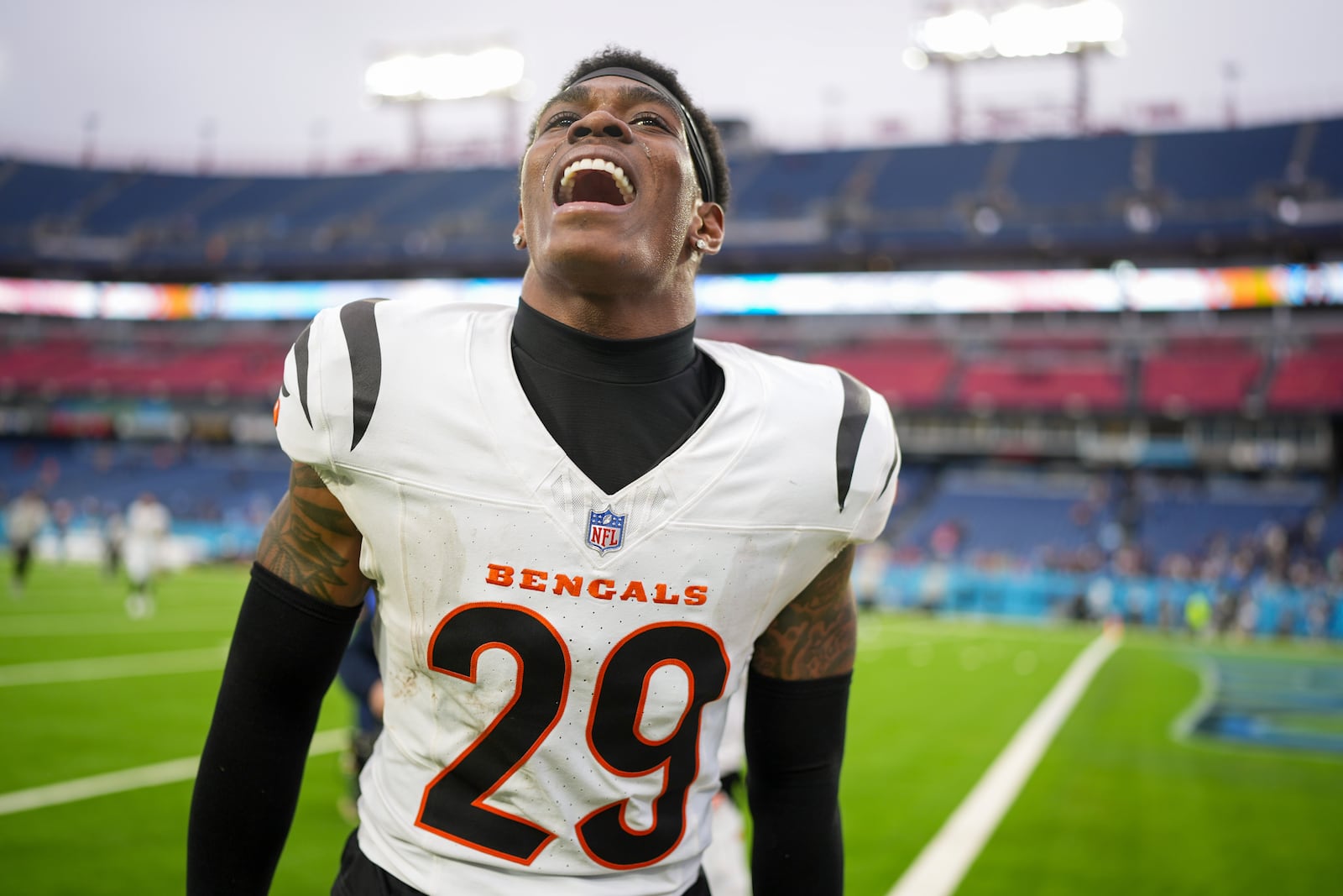 Cincinnati Bengals cornerback Cam Taylor-Britt (29) celebrates after an NFL football game against the Tennessee Titans, Sunday, Dec. 15, 2024, in Nashville, Tenn. The Bengals won 37-27. (AP Photo/George Walker IV)