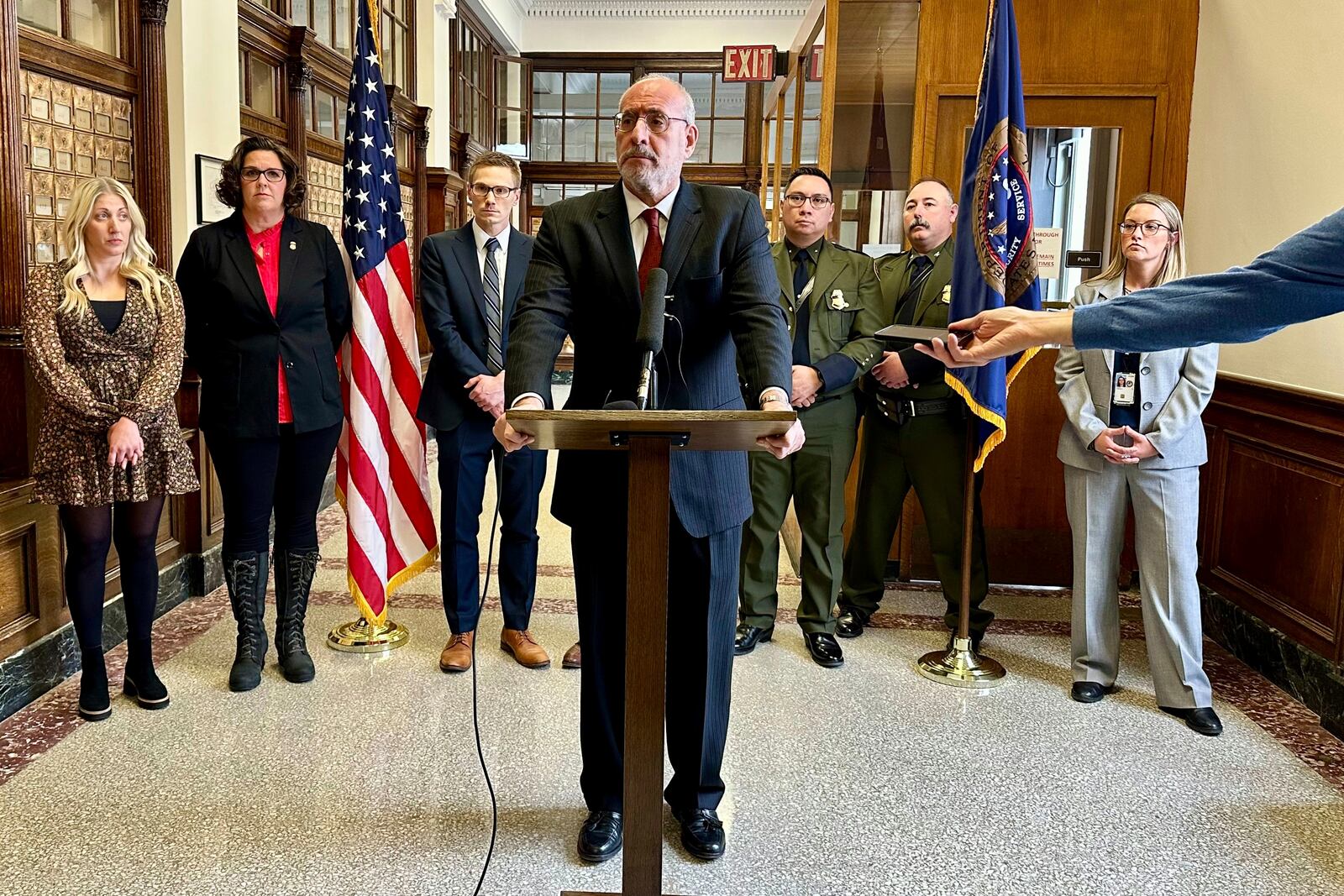 Minnesota U.S. Attorney Andy Luger addresses reporters on Friday, Nov. 22, 2024, at the federal courthouse in Fergus Falls, Minn., after two men were found guilty of human smuggling charges in connection with a case that led to the deaths of a family of four from India, who tried to cross the Canada-U.S. border during a blizzard in 2022. (AP Photo/Mark Vancleave)