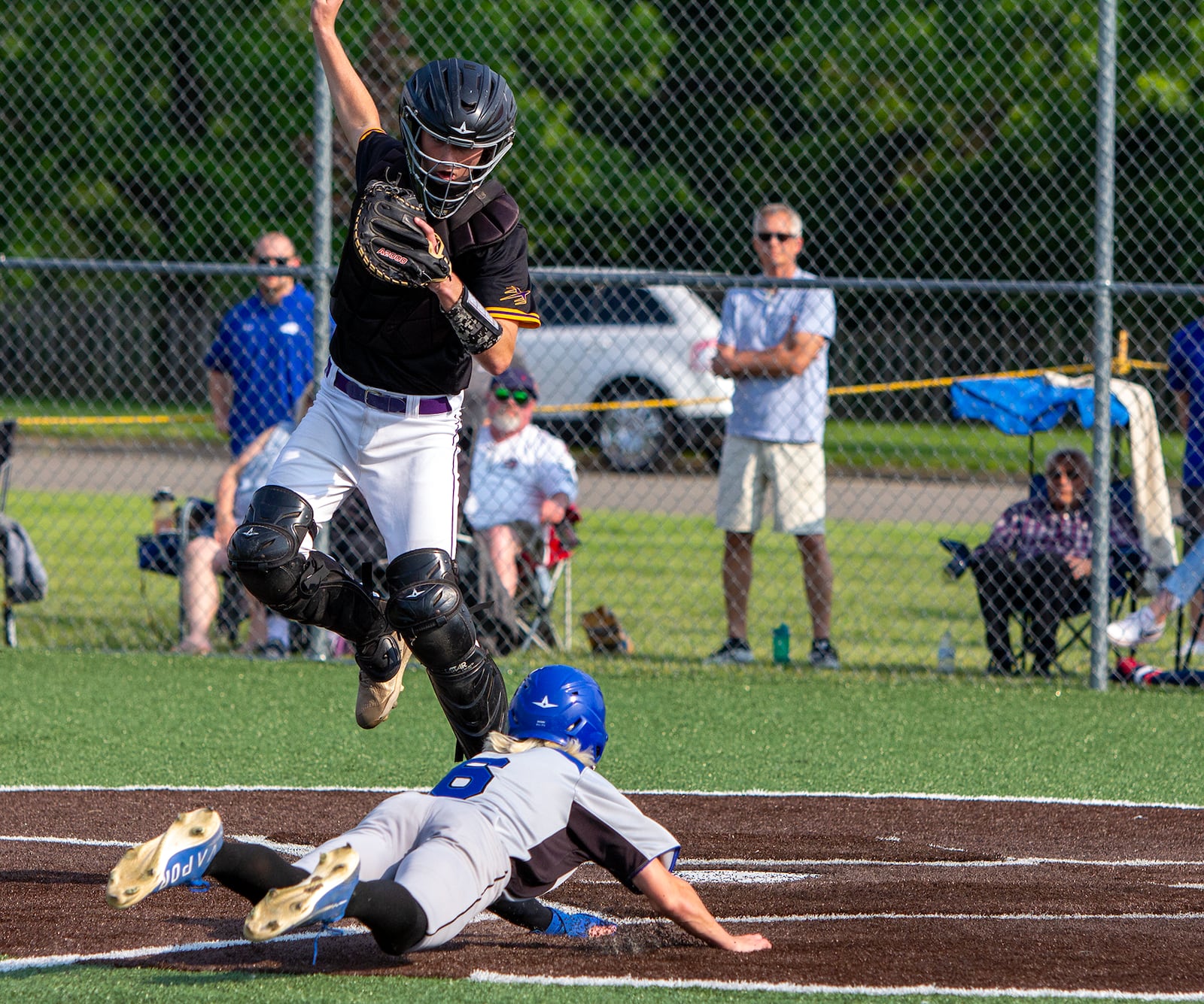 Springboro courtesy runner Vince Fortkamp scores on a throwing error in the fifth inning Tuesday in the Panthers' 3-0 tournament victory at Vandalia Butler. Jeff Gilbert/CONTRIB
UTED