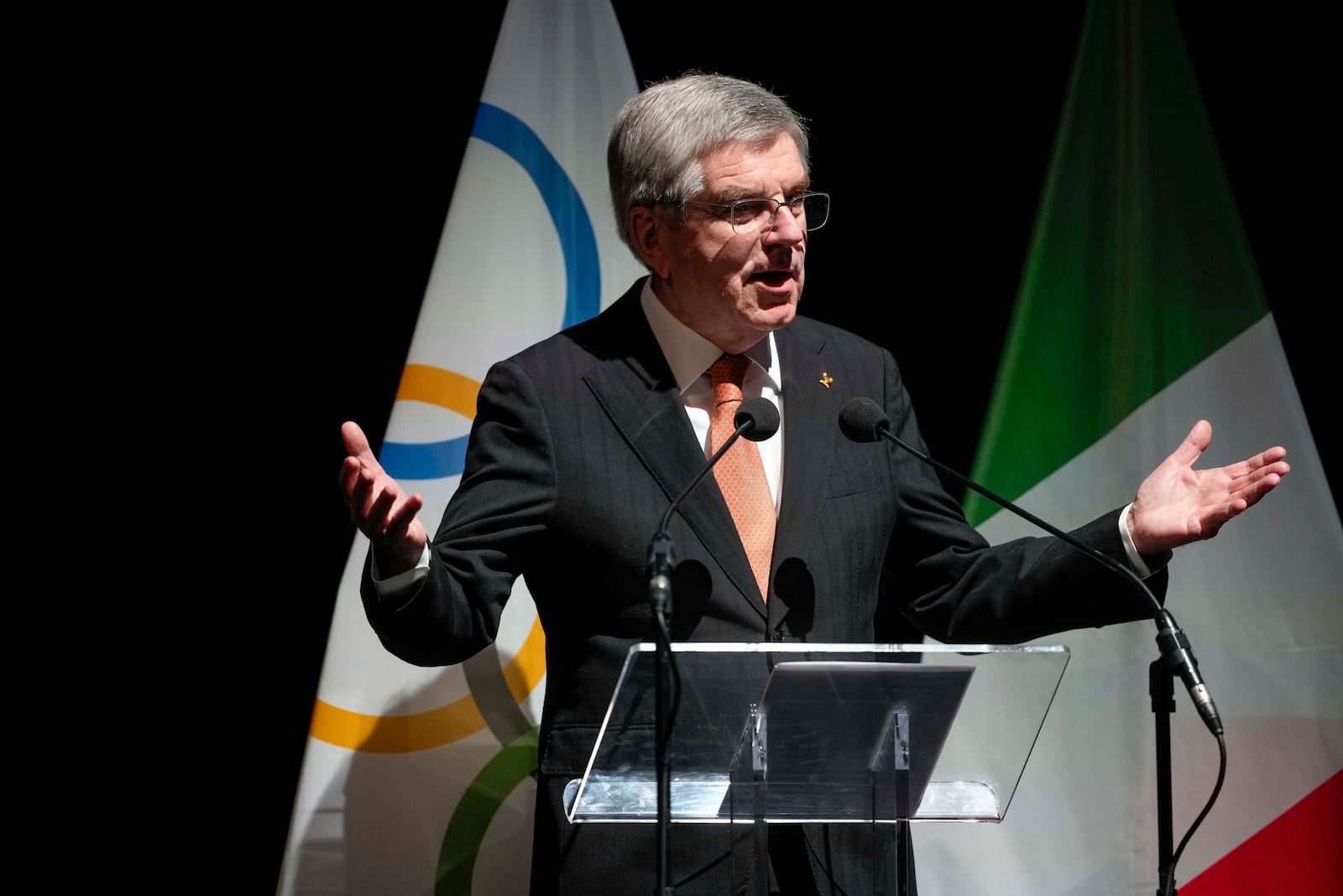 IOC President Thomas Bach attends the ceremony 'One Year To Go' for the 2026 Milano-Cortina Winter Olympics, at the Strehler Theatre, in Milan, Thursday, Feb. 6, 2025. (AP Photo/Luca Bruno)