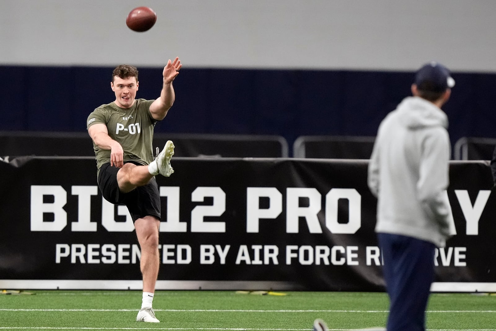 BYU punter Ryan Rehkow kicks during Big 12 NCAA college NFL football pro day Thursday, Saturday, March 30, 2024, in Frisco, Texas. (AP Photo/LM Otero)