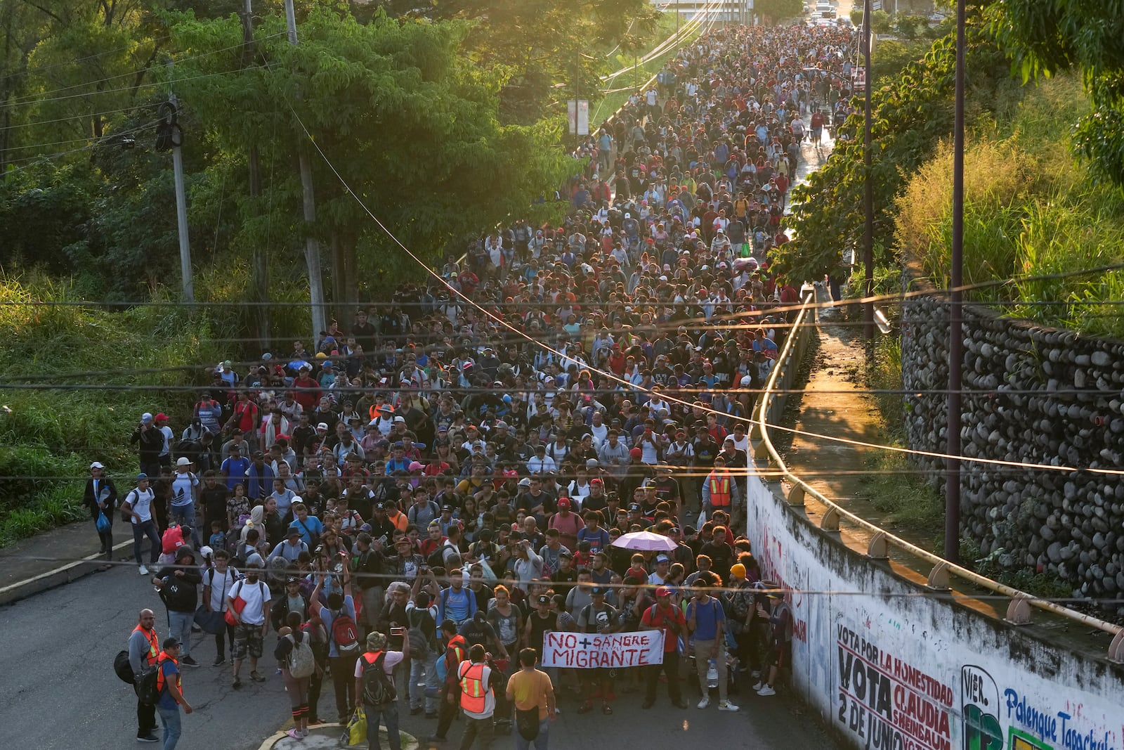 Migrants depart Tapachula, Mexico, in hopes to reach the country's northern border and ultimately the United States, Tuesday, Nov. 5, 2024. (AP Photo/Moises Castillo)